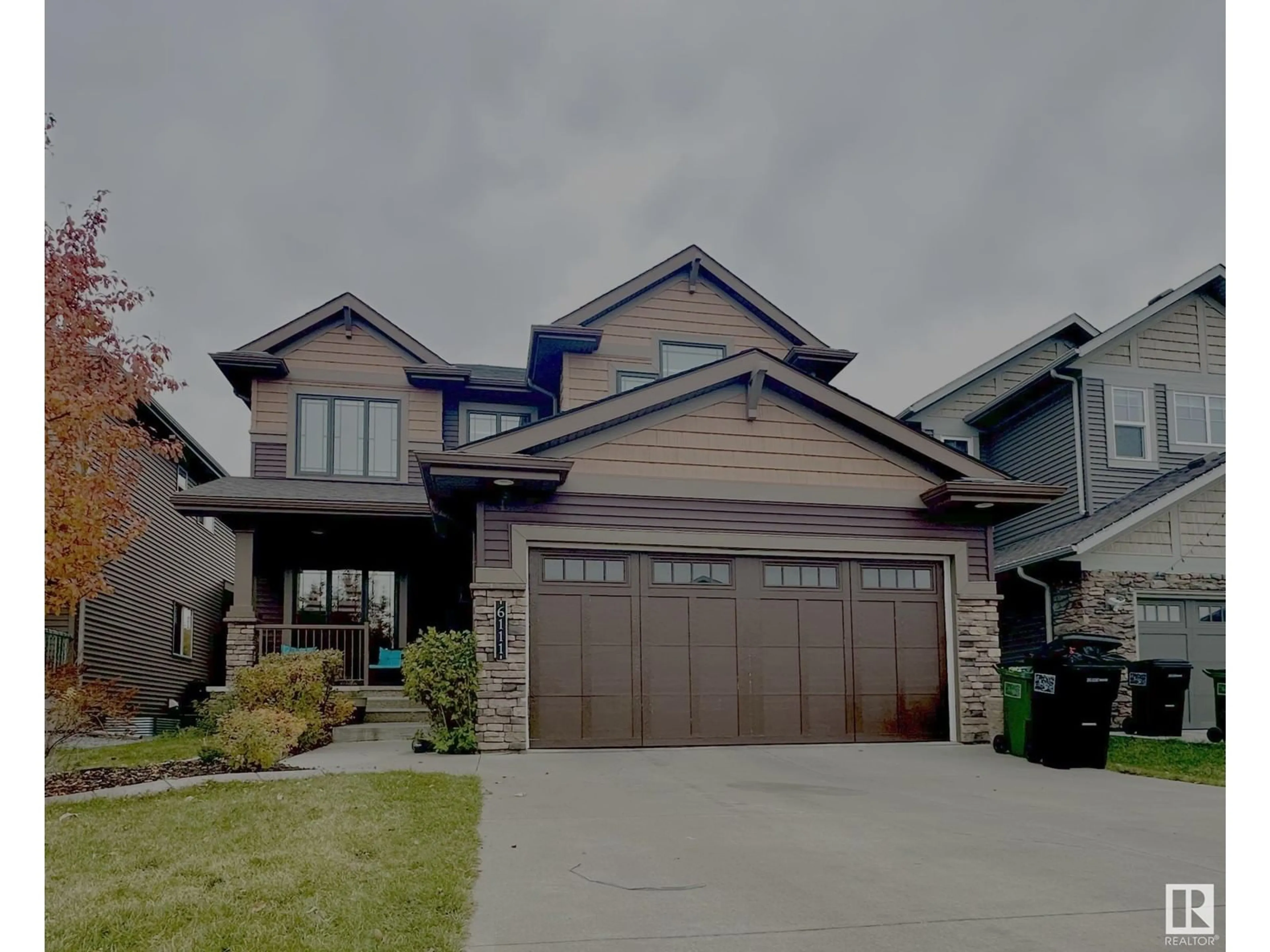 Frontside or backside of a home, the street view for 6111 19 AV SW, Edmonton Alberta T6X2A4