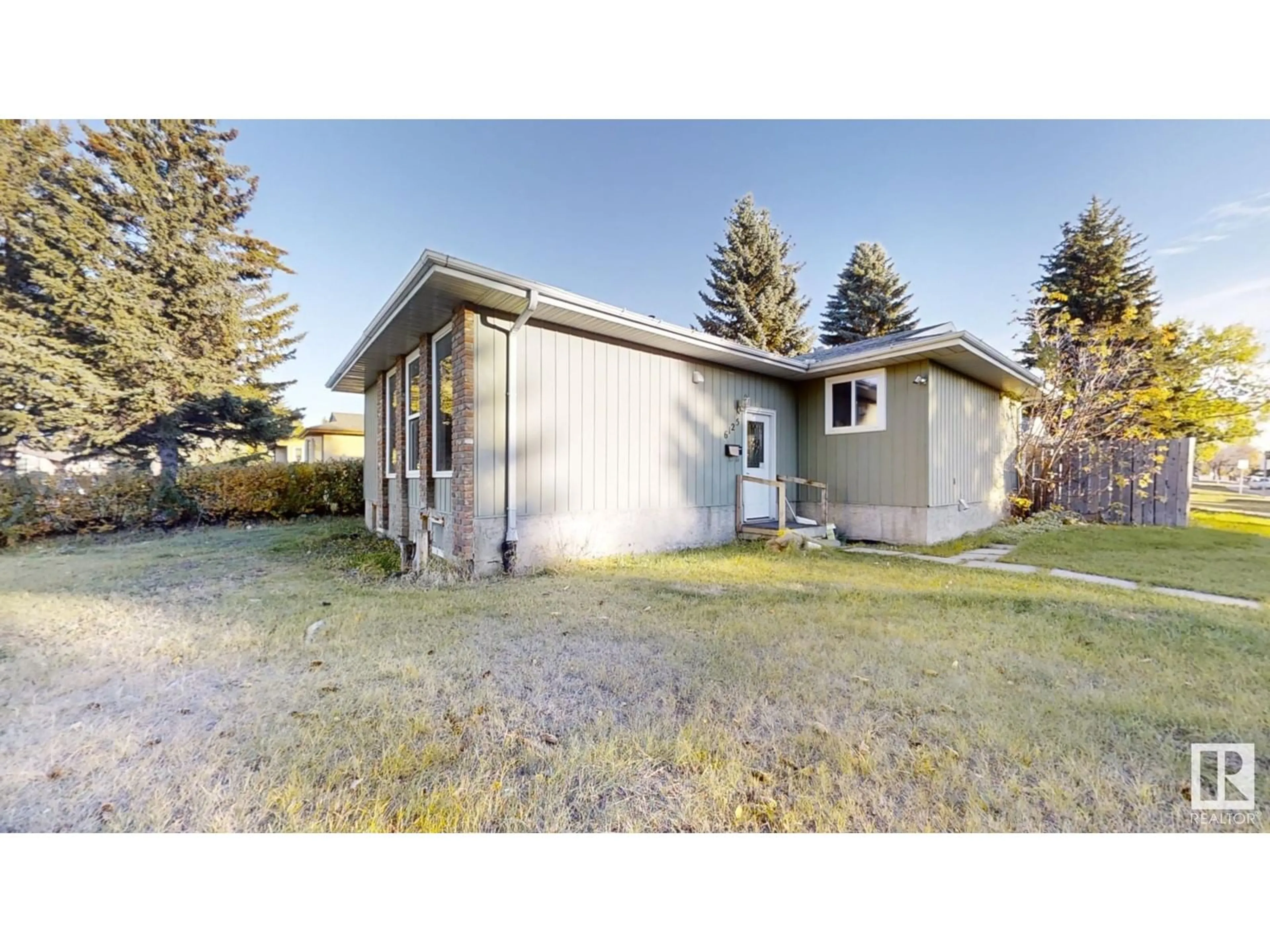 Frontside or backside of a home, cottage for 6125 17A Ave NW, Edmonton Alberta T6L2B8