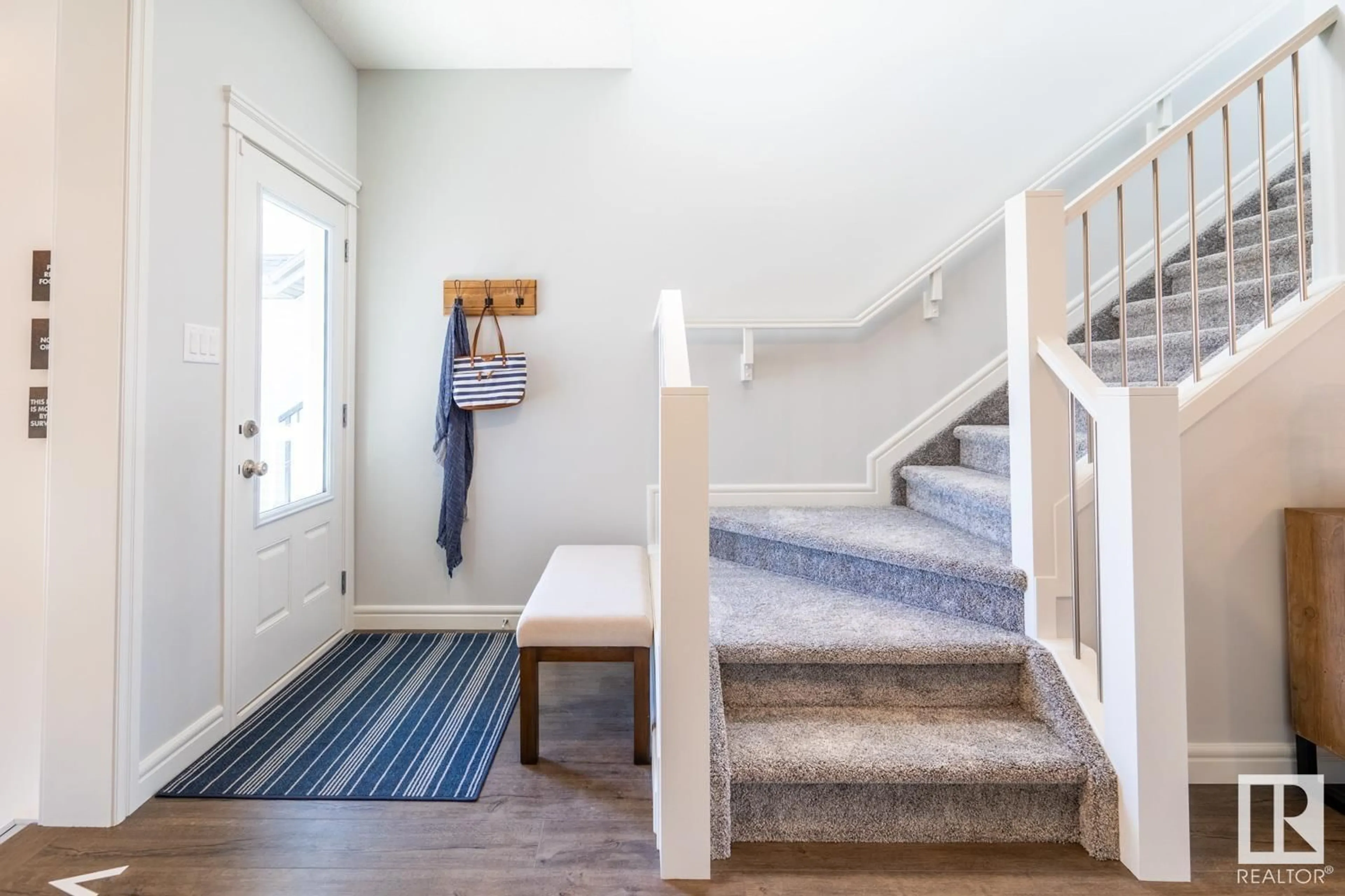 Indoor entryway, carpet floors for 7164 182 AV NW, Edmonton Alberta T5Y4B7