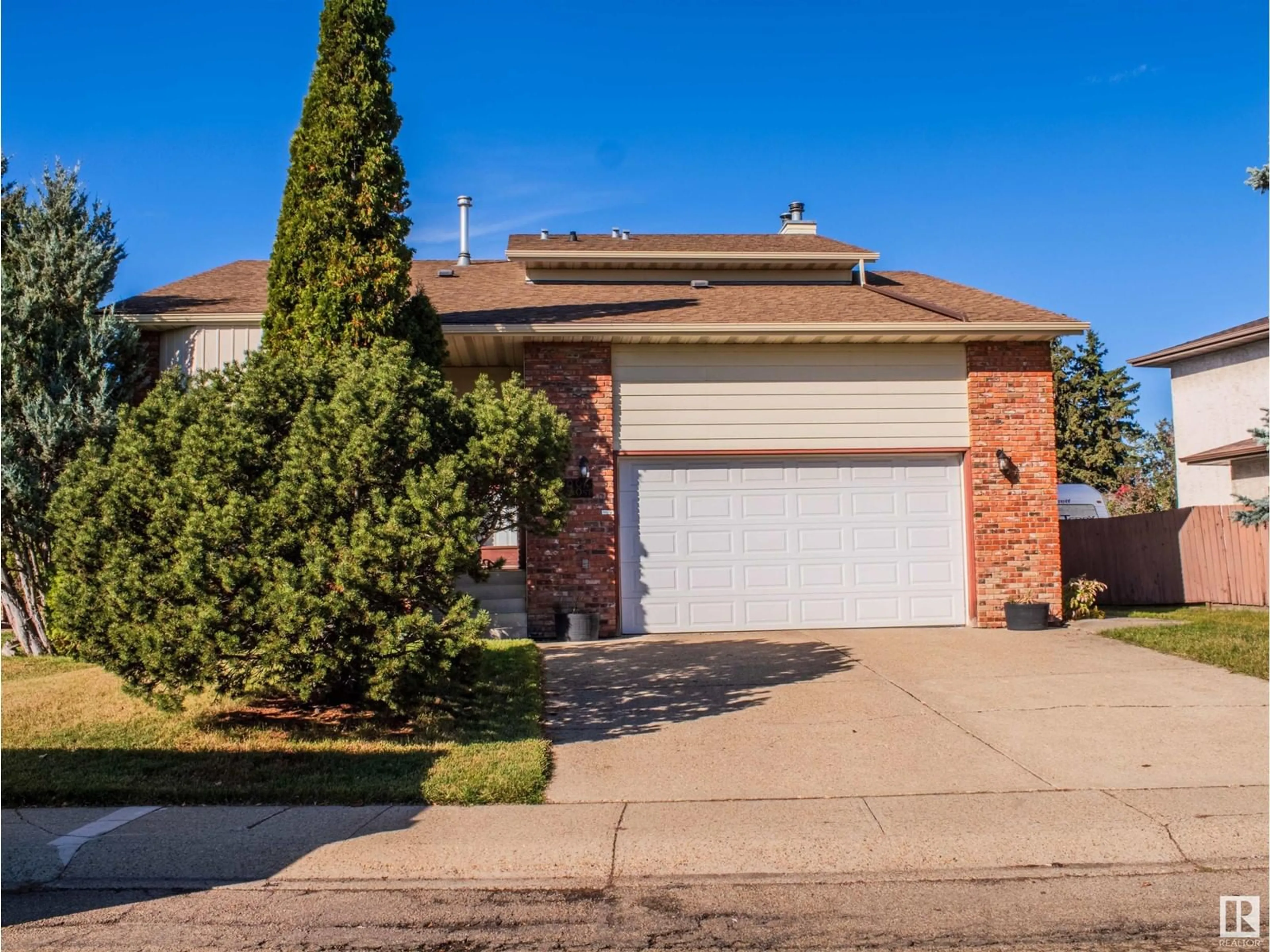 Frontside or backside of a home, the street view for 14004 120 ST NW, Edmonton Alberta T5X4X8