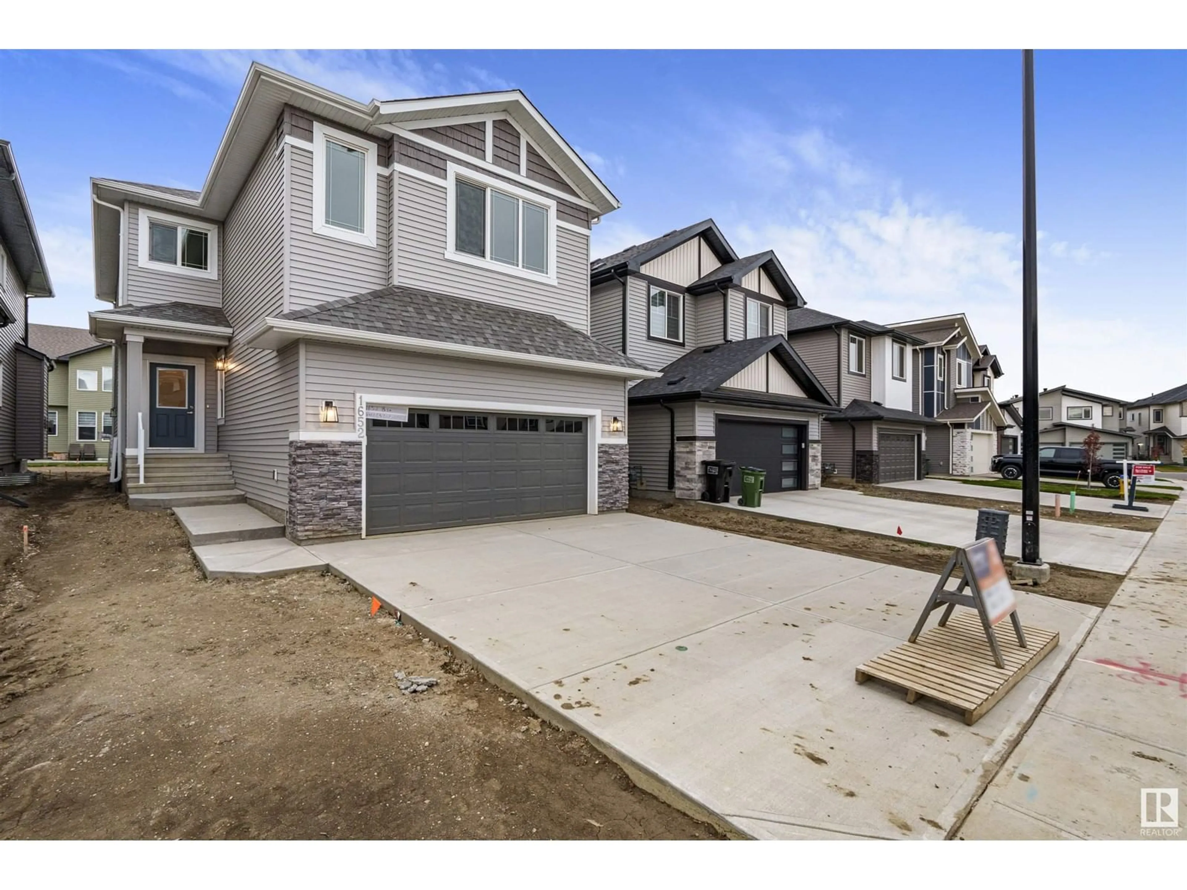 Frontside or backside of a home, the street view for 1652 13 ST NW, Edmonton Alberta T6T2N5