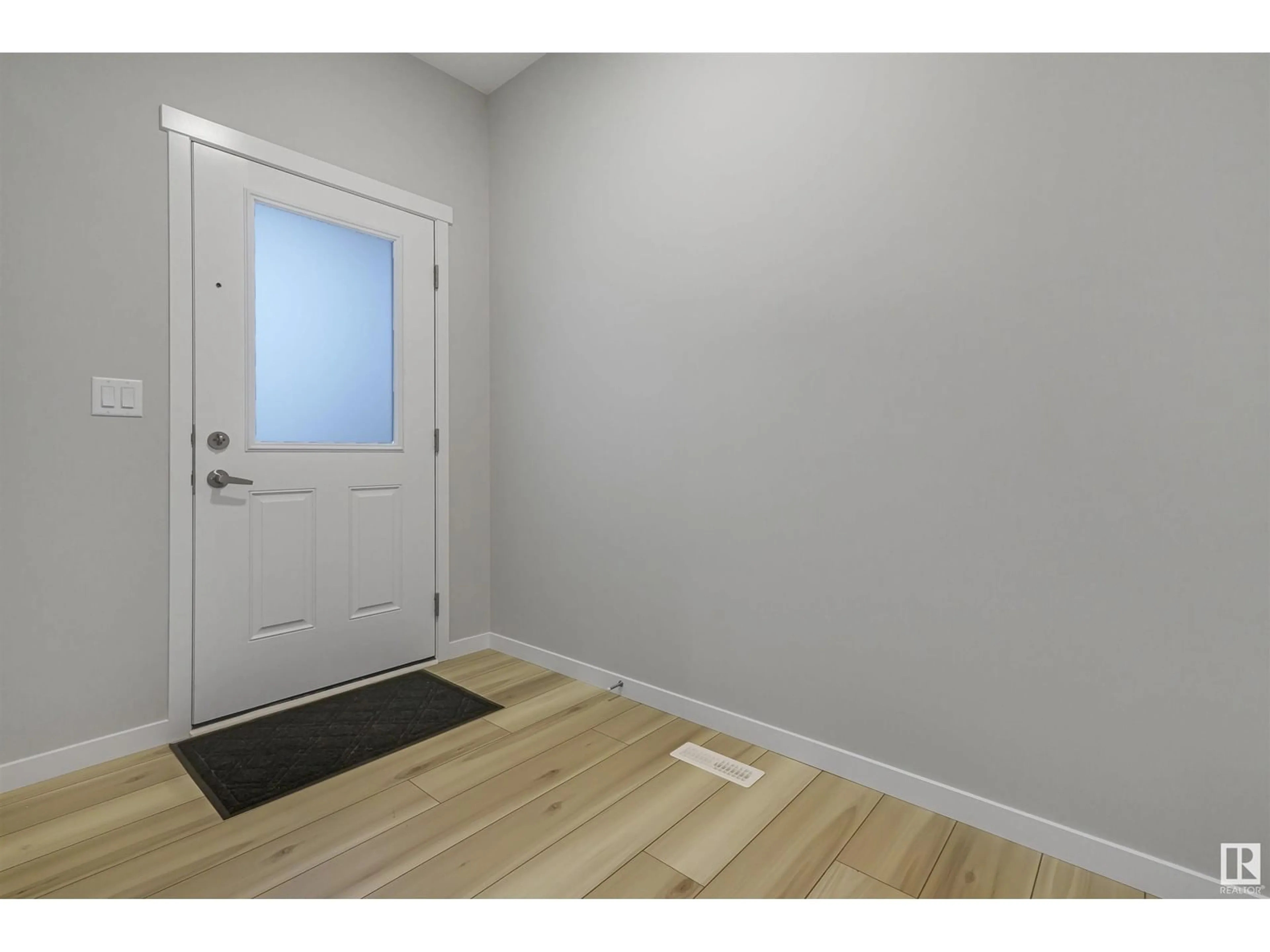 Indoor entryway, wood floors for 1652 13 ST NW, Edmonton Alberta T6T2N5