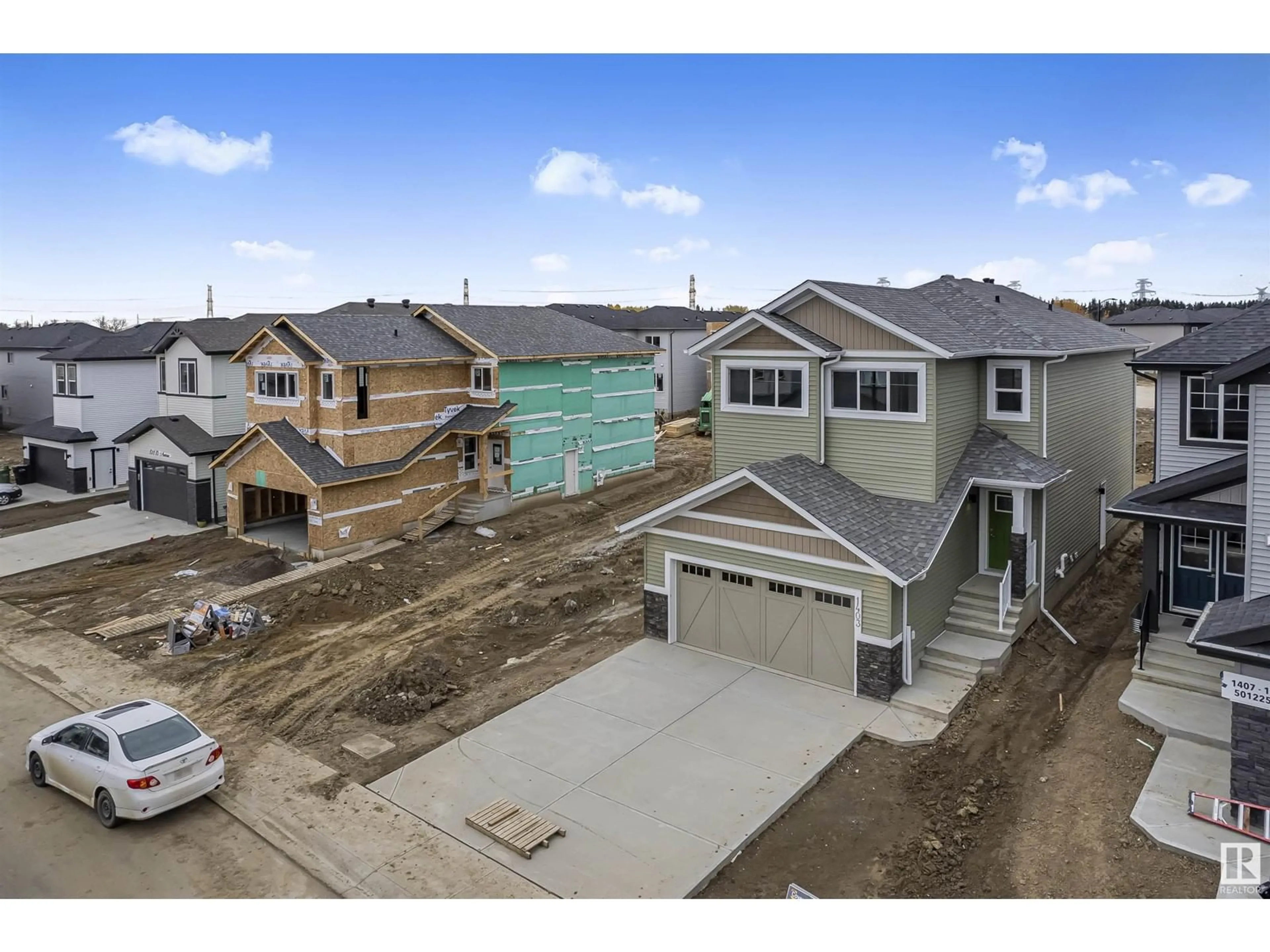 Frontside or backside of a home, the fenced backyard for 1403 13 AV NW, Edmonton Alberta T6T2S7