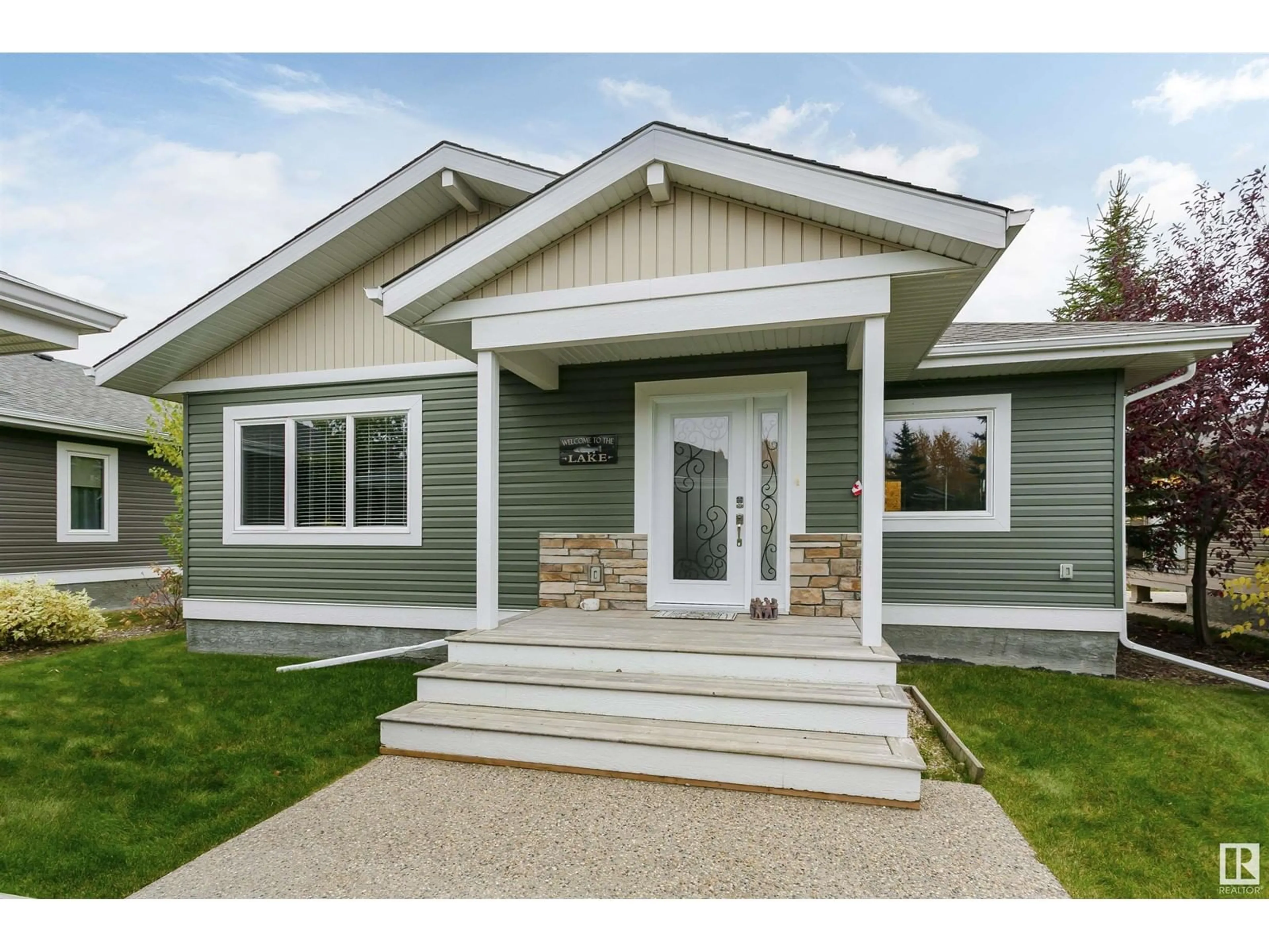 Home with vinyl exterior material for #323 55101 STE. ANNE TR, Rural Lac Ste. Anne County Alberta T0E1A1