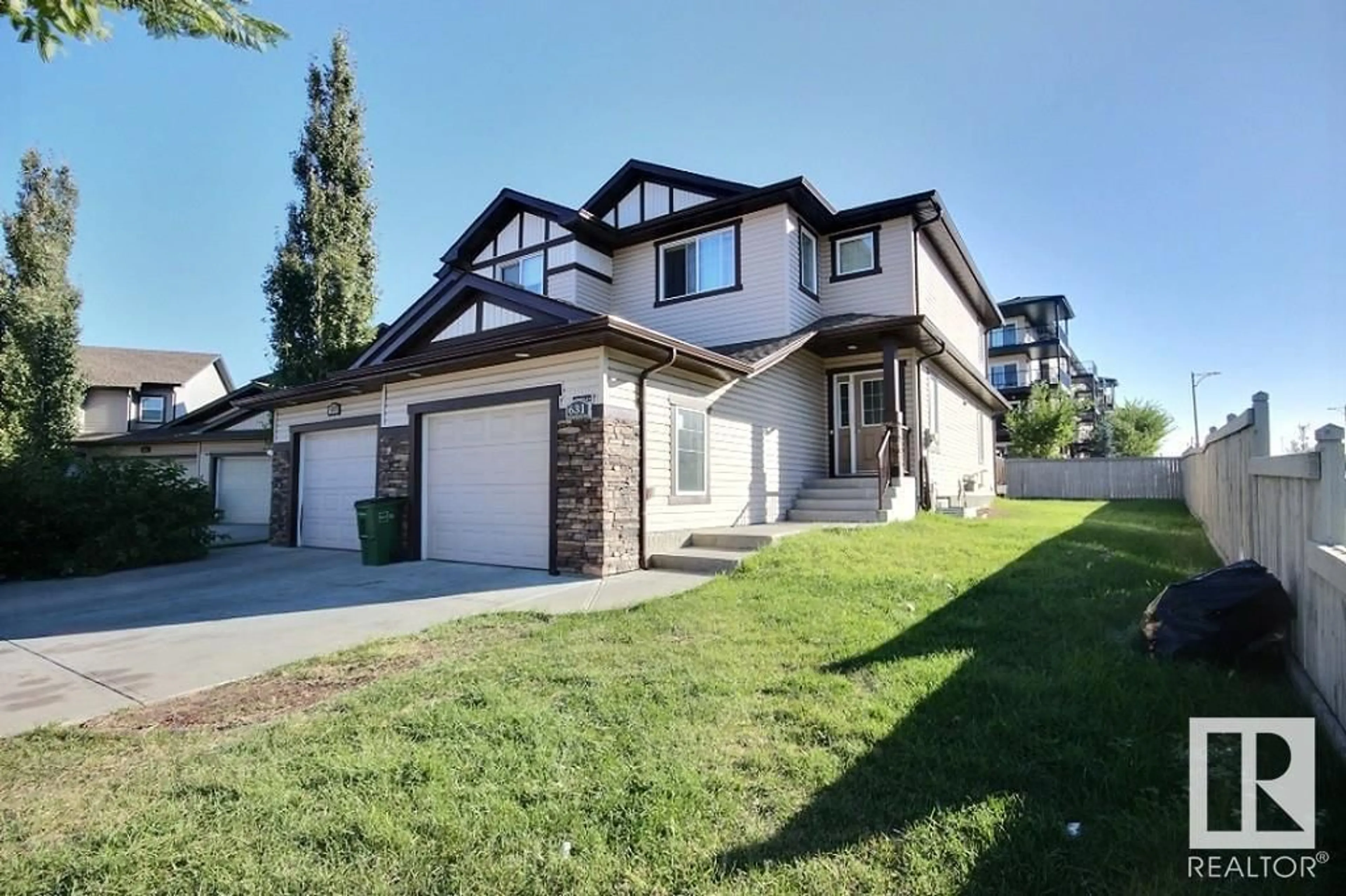 Frontside or backside of a home, the fenced backyard for 631 56 ST SW, Edmonton Alberta T6X1S1