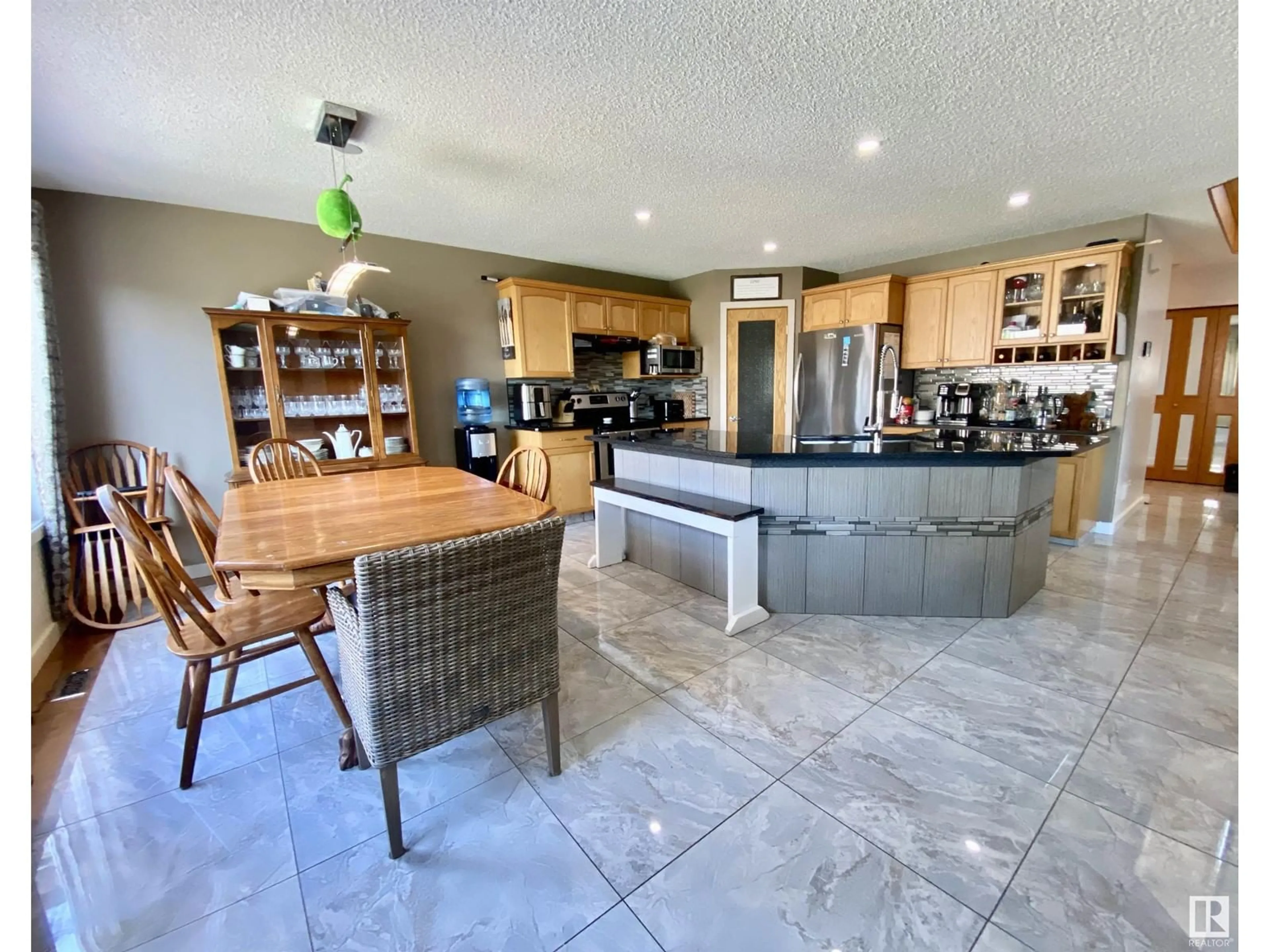 Open concept kitchen for 10932 177 AV NW, Edmonton Alberta T5X6H5