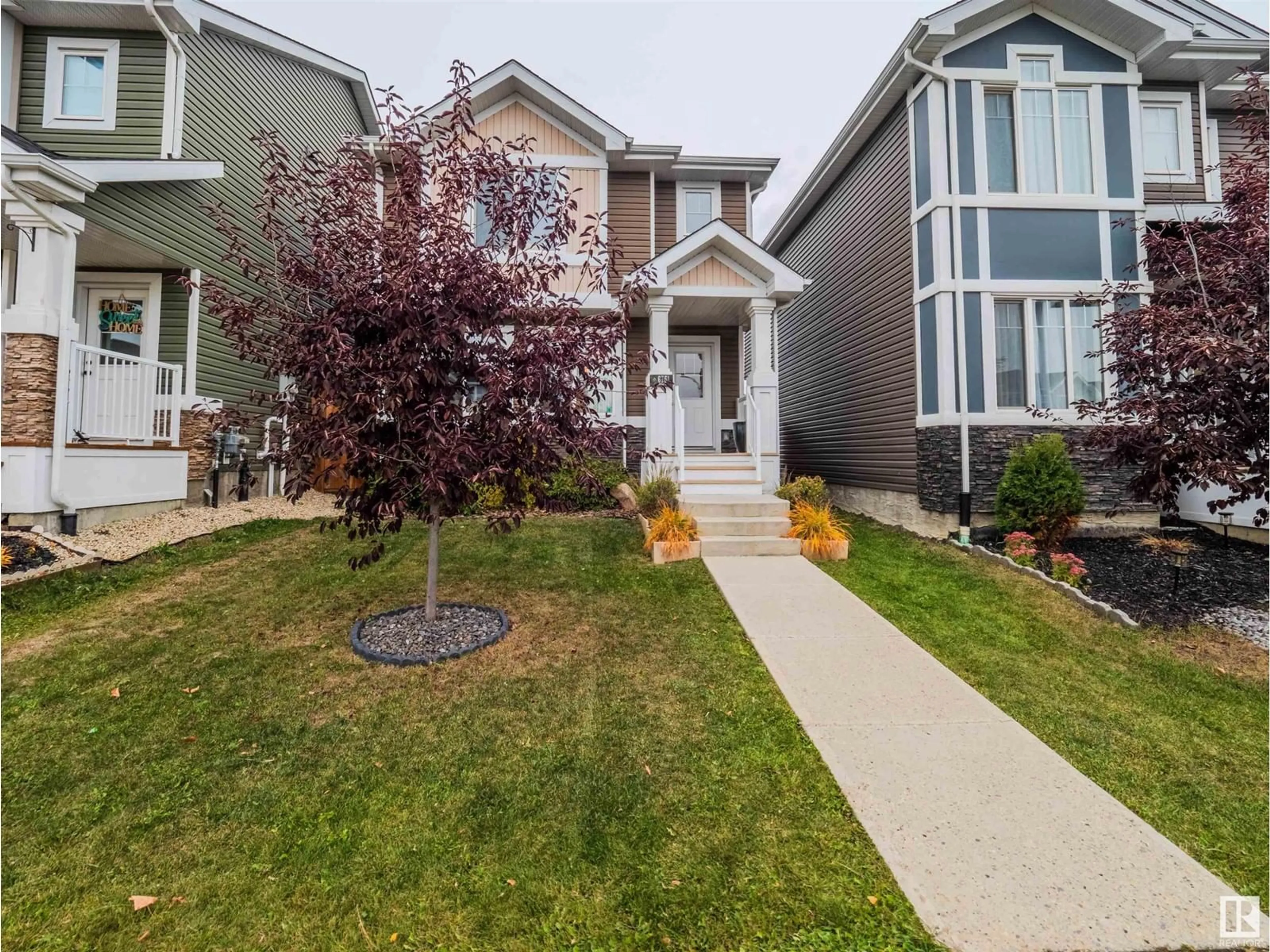 Frontside or backside of a home, the street view for 6751 ELSTON LN NW, Edmonton Alberta T6M0T5