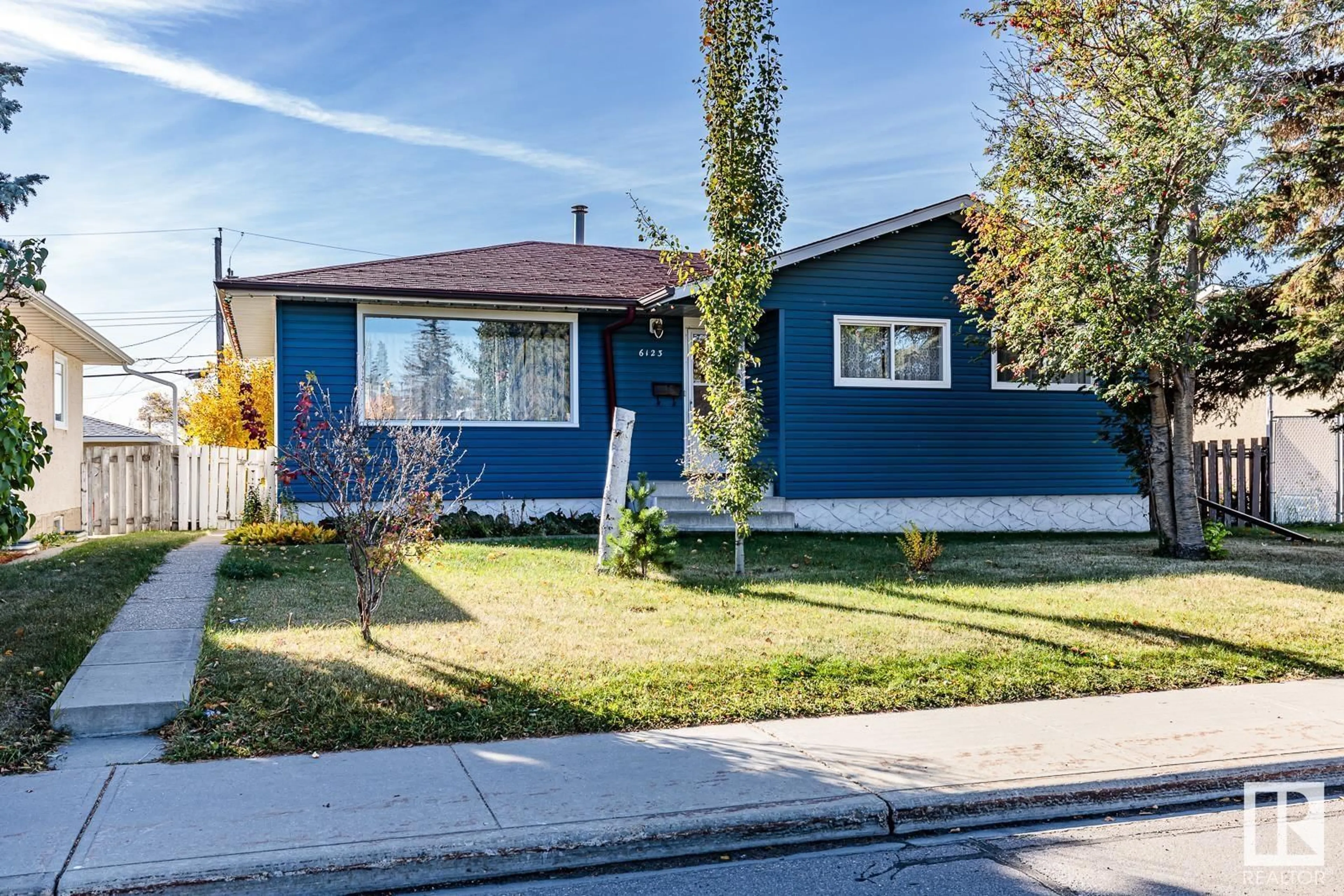 Frontside or backside of a home, the street view for 6123 144 AV NW NW, Edmonton Alberta T5A1K8