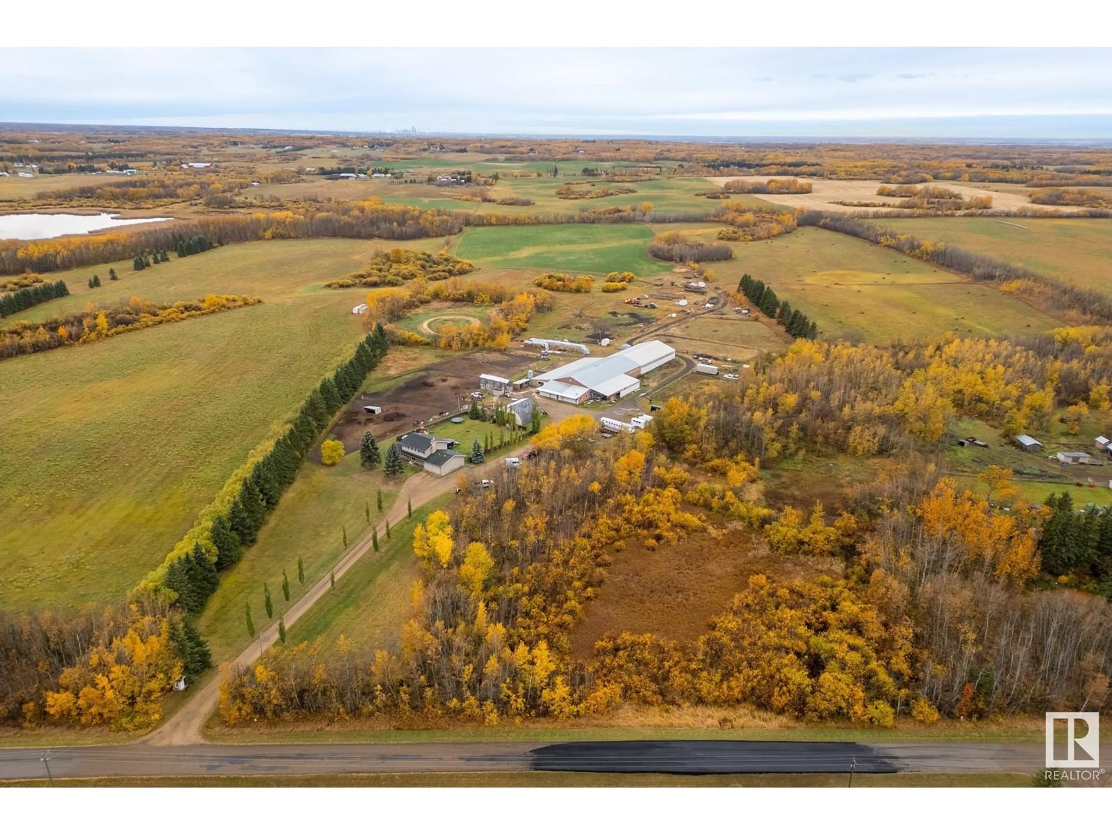 A pic from exterior of the house or condo, the fenced backyard for 53322 RGE ROAD 213, Rural Strathcona County Alberta T0B0E0