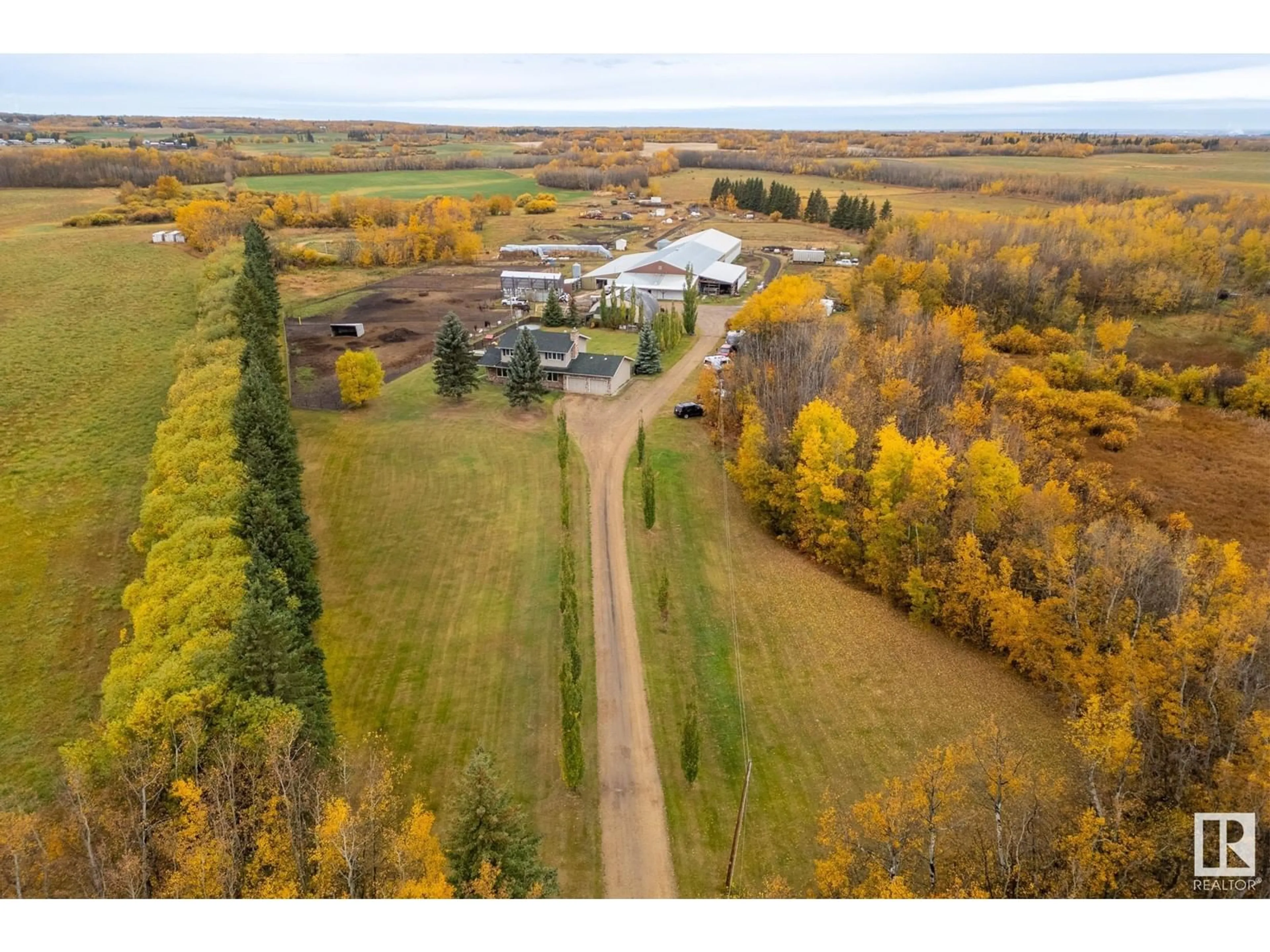 A pic from exterior of the house or condo, the fenced backyard for 53322 RGE ROAD 213, Rural Strathcona County Alberta T0B0E0