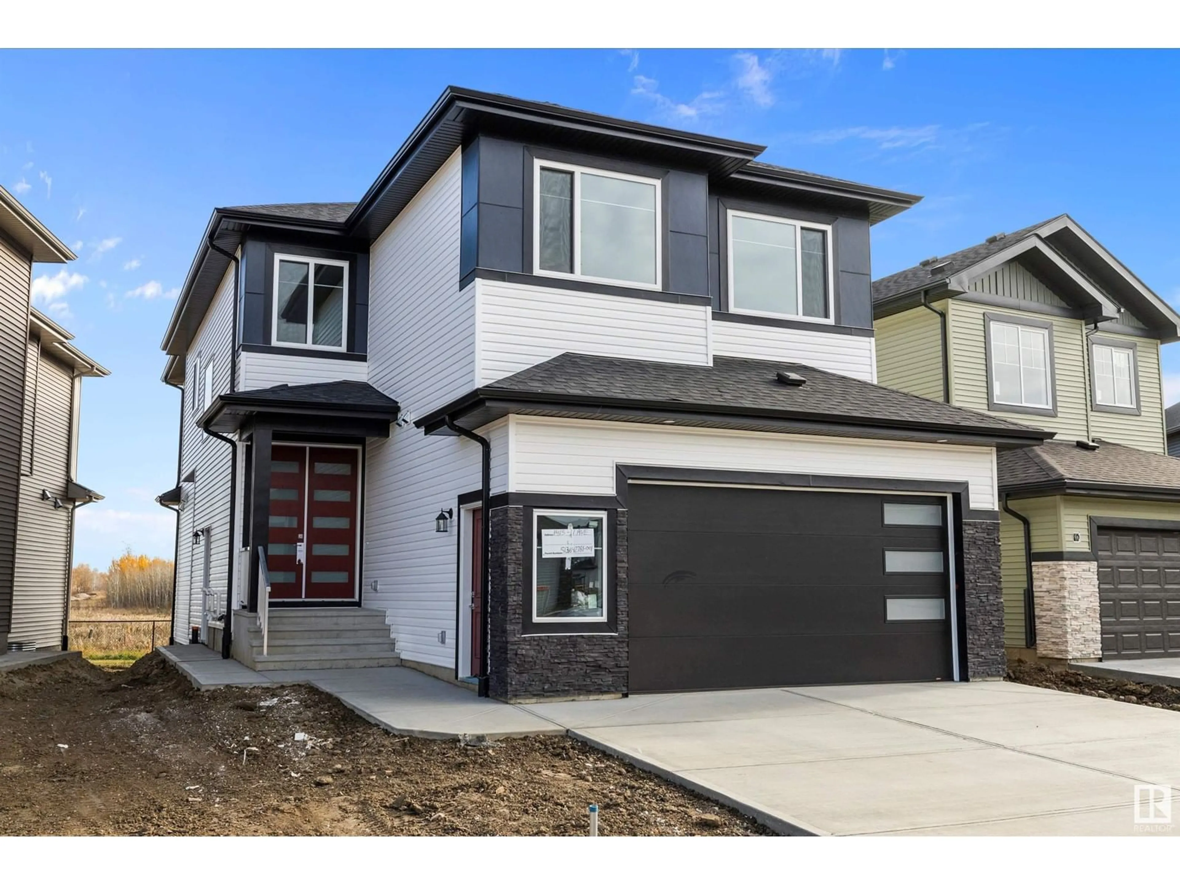 Frontside or backside of a home, the street view for 1415 11 AV NW, Edmonton Alberta T6T2W4