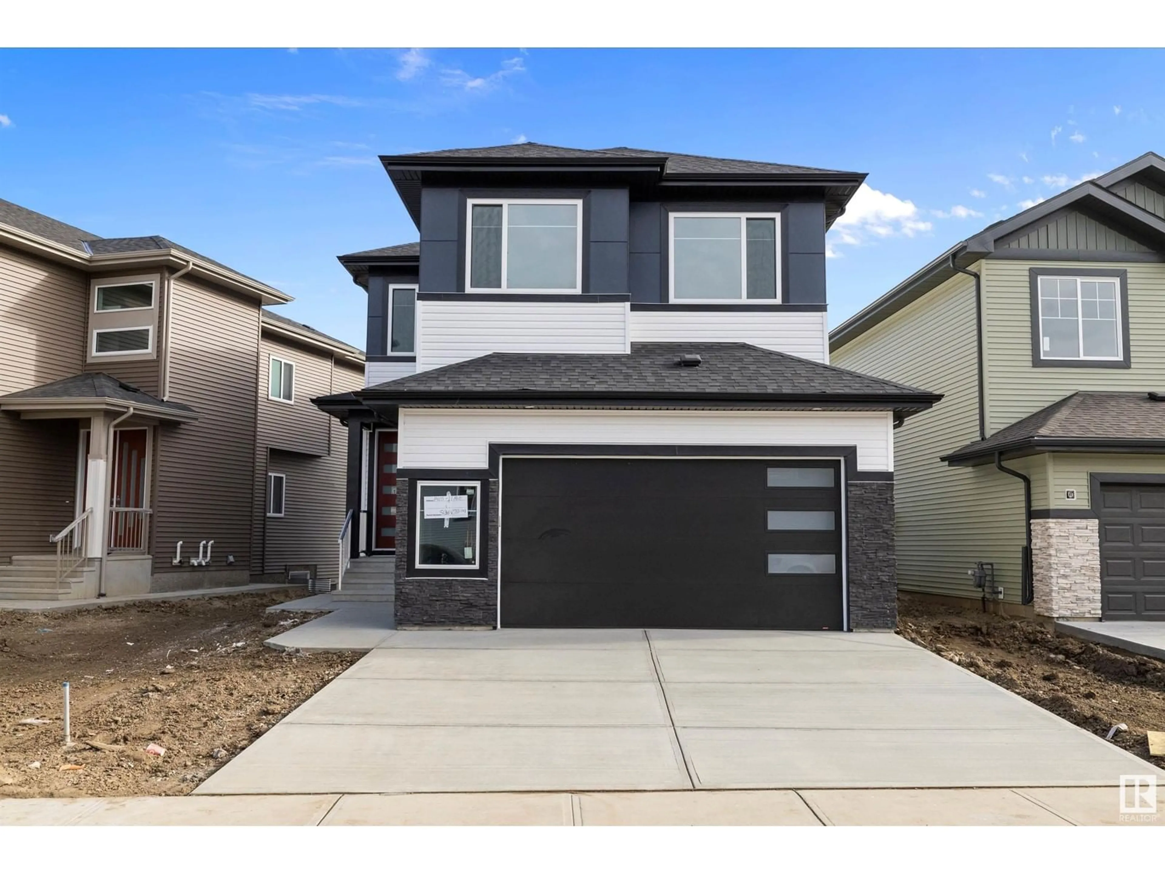 Frontside or backside of a home, the street view for 1415 11 AV NW, Edmonton Alberta T6T2W4