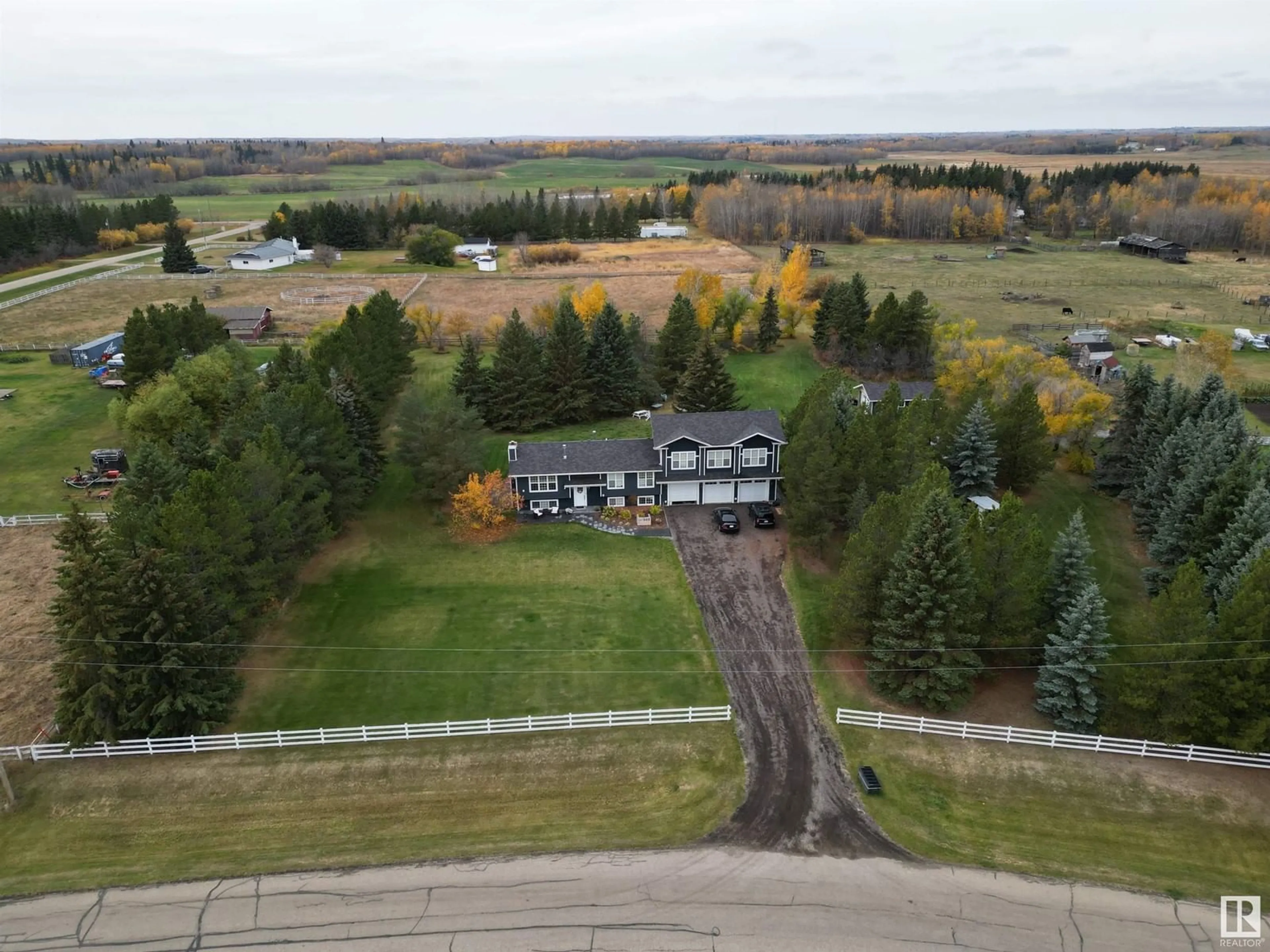 A pic from exterior of the house or condo, the fenced backyard for #349 52249 RGE ROAD 222, Rural Strathcona County Alberta T8C1J2