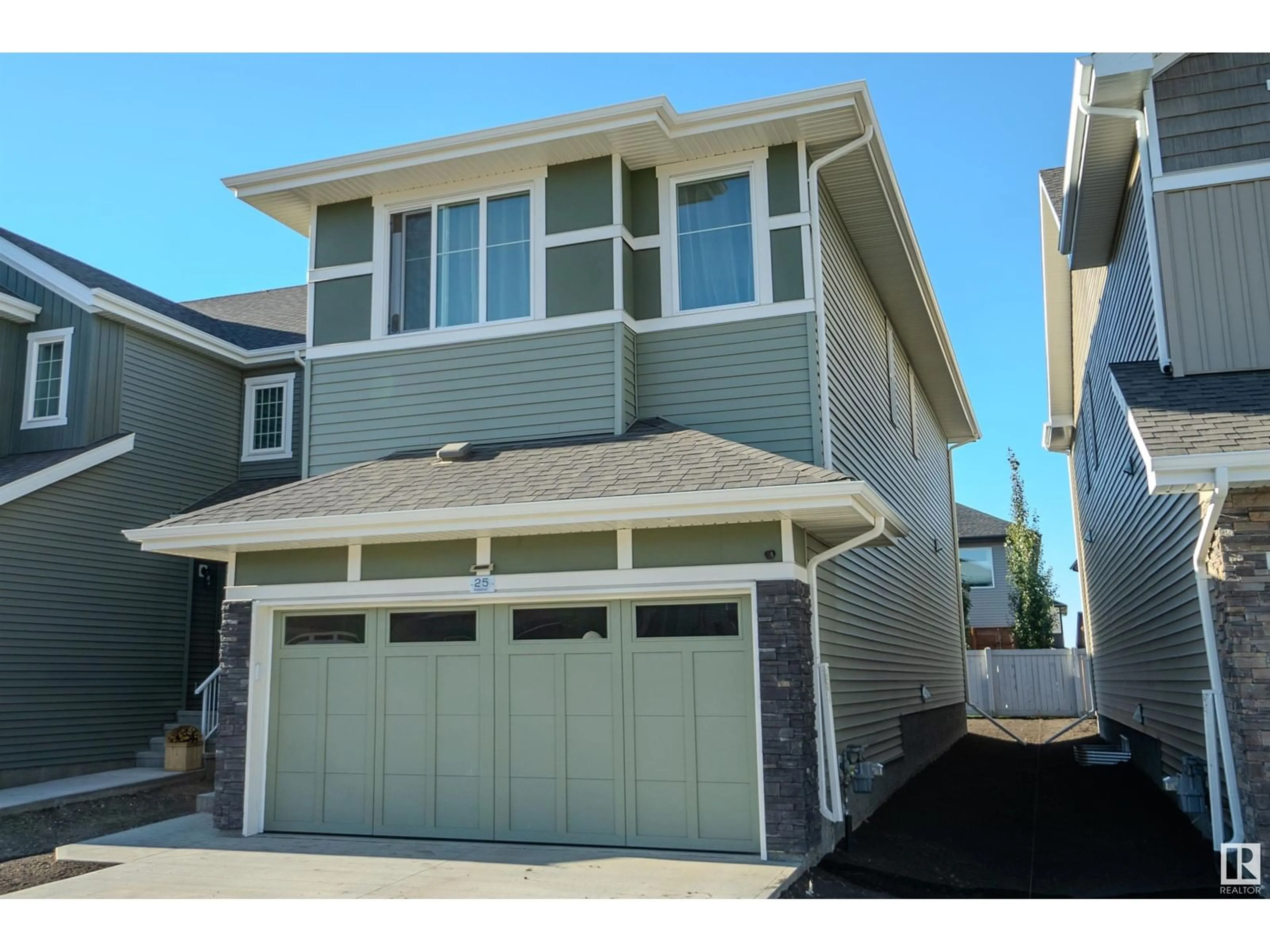 A pic from exterior of the house or condo, the street view for 25 MEADOWBROOK WY, Spruce Grove Alberta T7X0G7