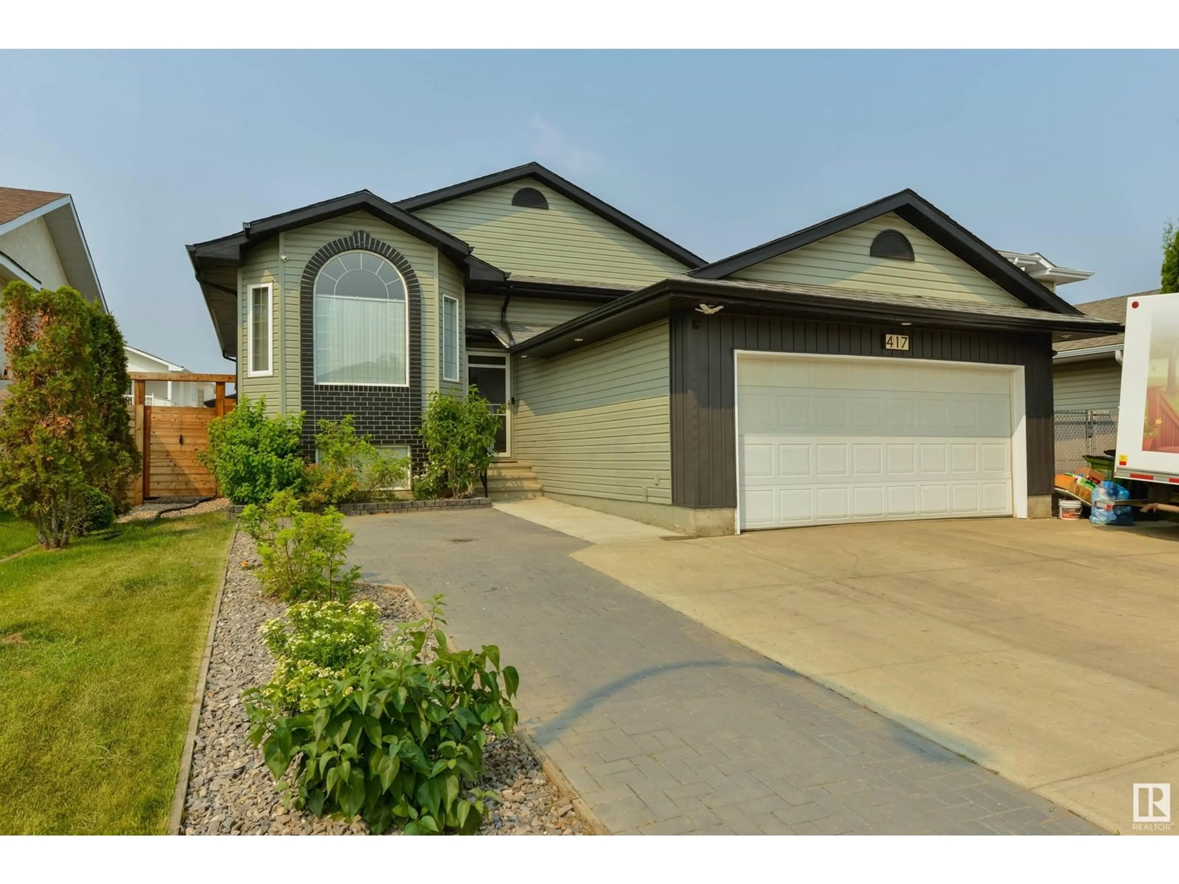 Frontside or backside of a home, the street view for 417 HOLLICK-KENYON RD NW, Edmonton Alberta T5Y2T9