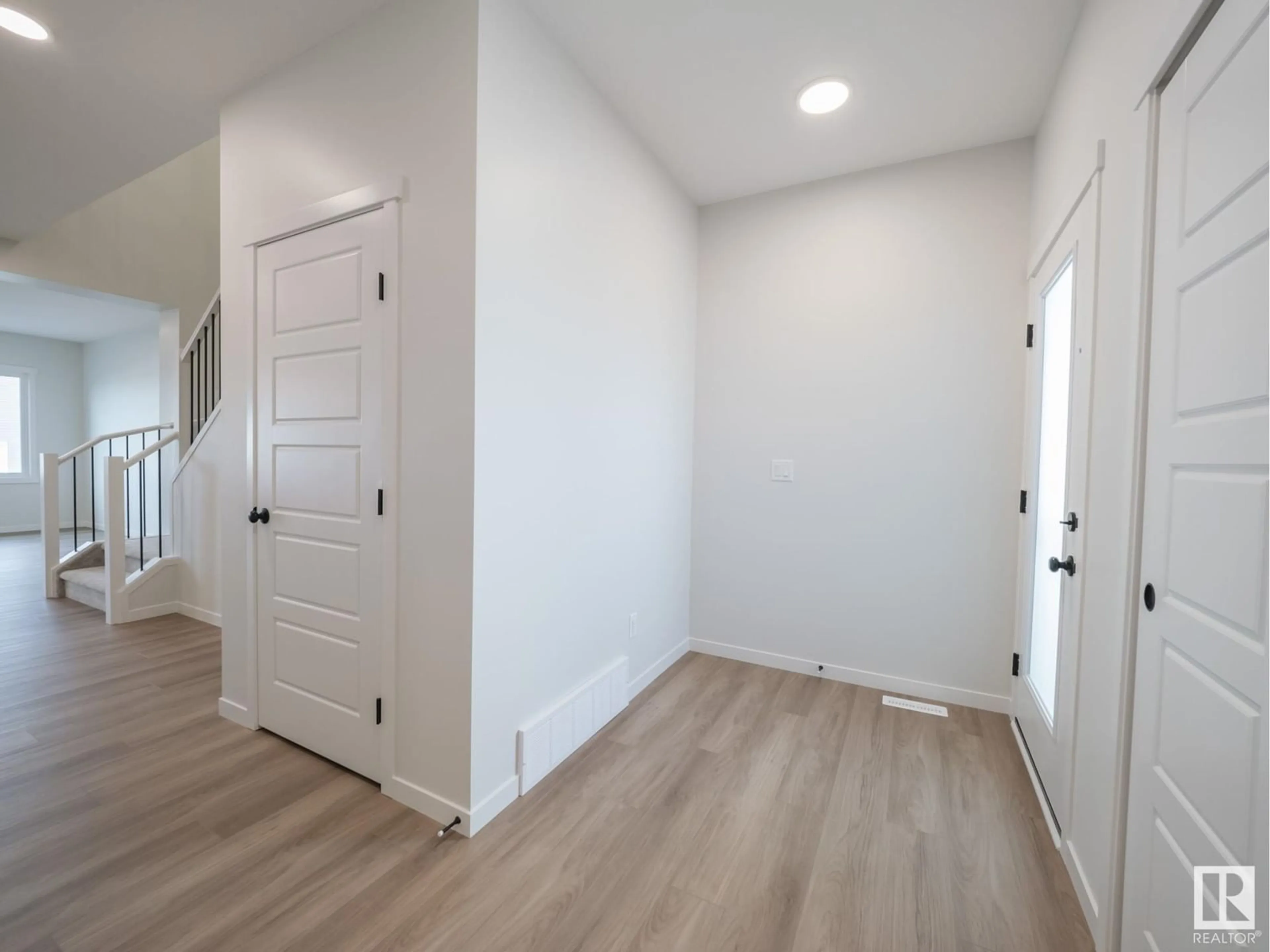 Indoor entryway, wood floors for 2424 206 ST NW, Edmonton Alberta T6M1N6