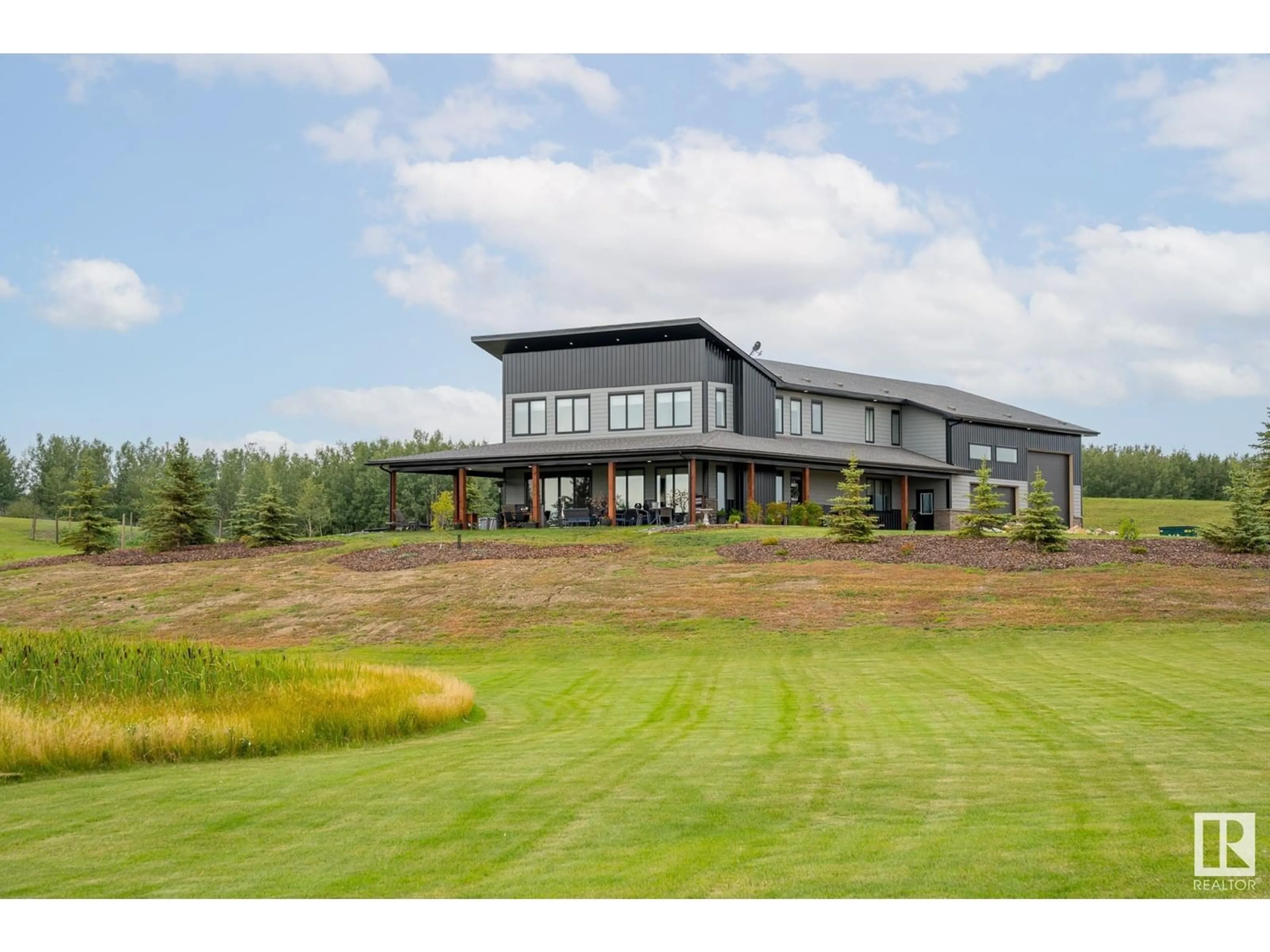 Frontside or backside of a home, the front or back of building for #54 53156 RGE RD 213, Rural Strathcona County Alberta T8G2C3