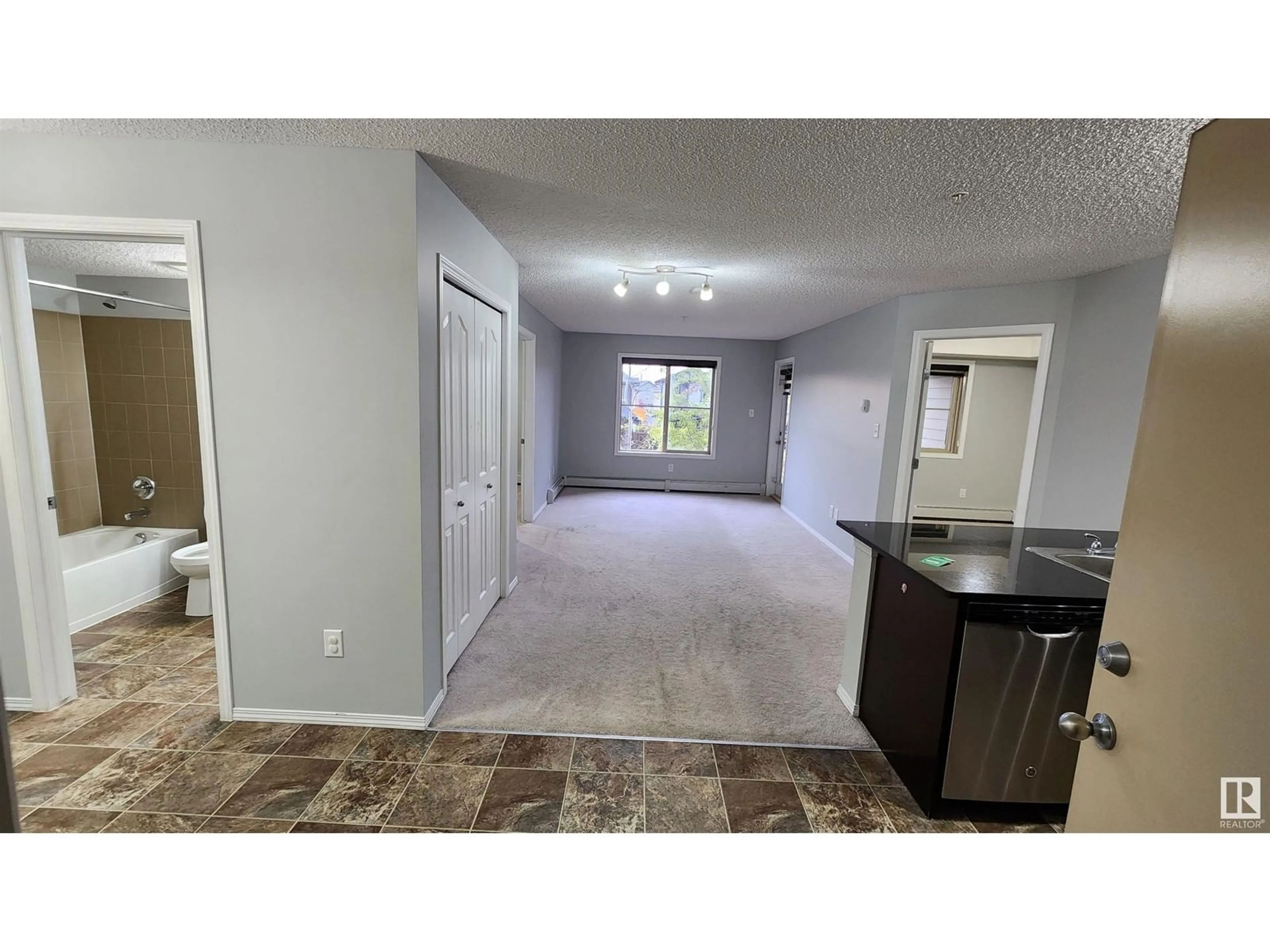 A pic of a room, carpet floors for #210 1080 MCCONACHIE BV NW, Edmonton Alberta T5Y0X2