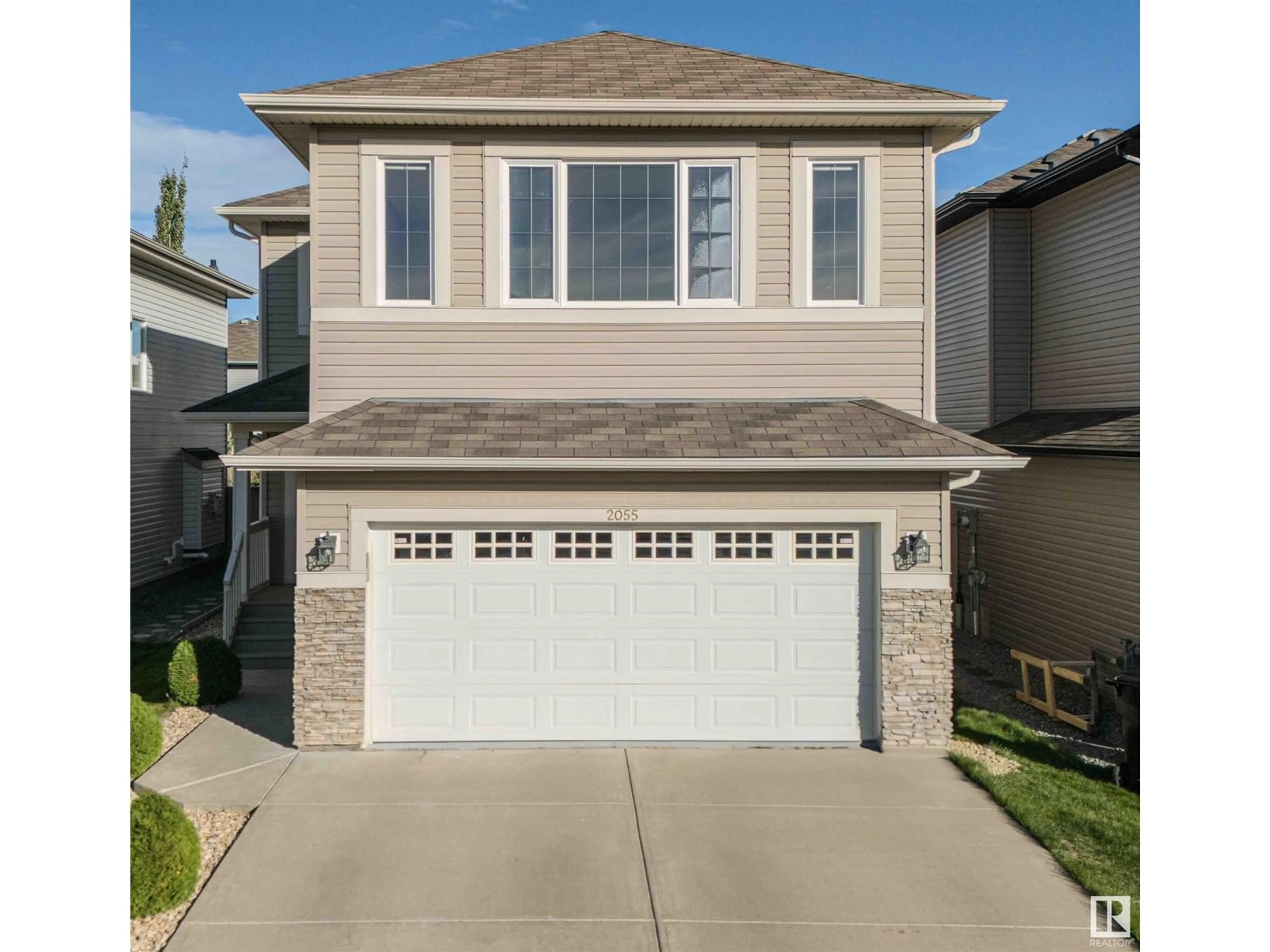 Frontside or backside of a home, the street view for 2055 33B ST NW NW, Edmonton Alberta T6T0L2