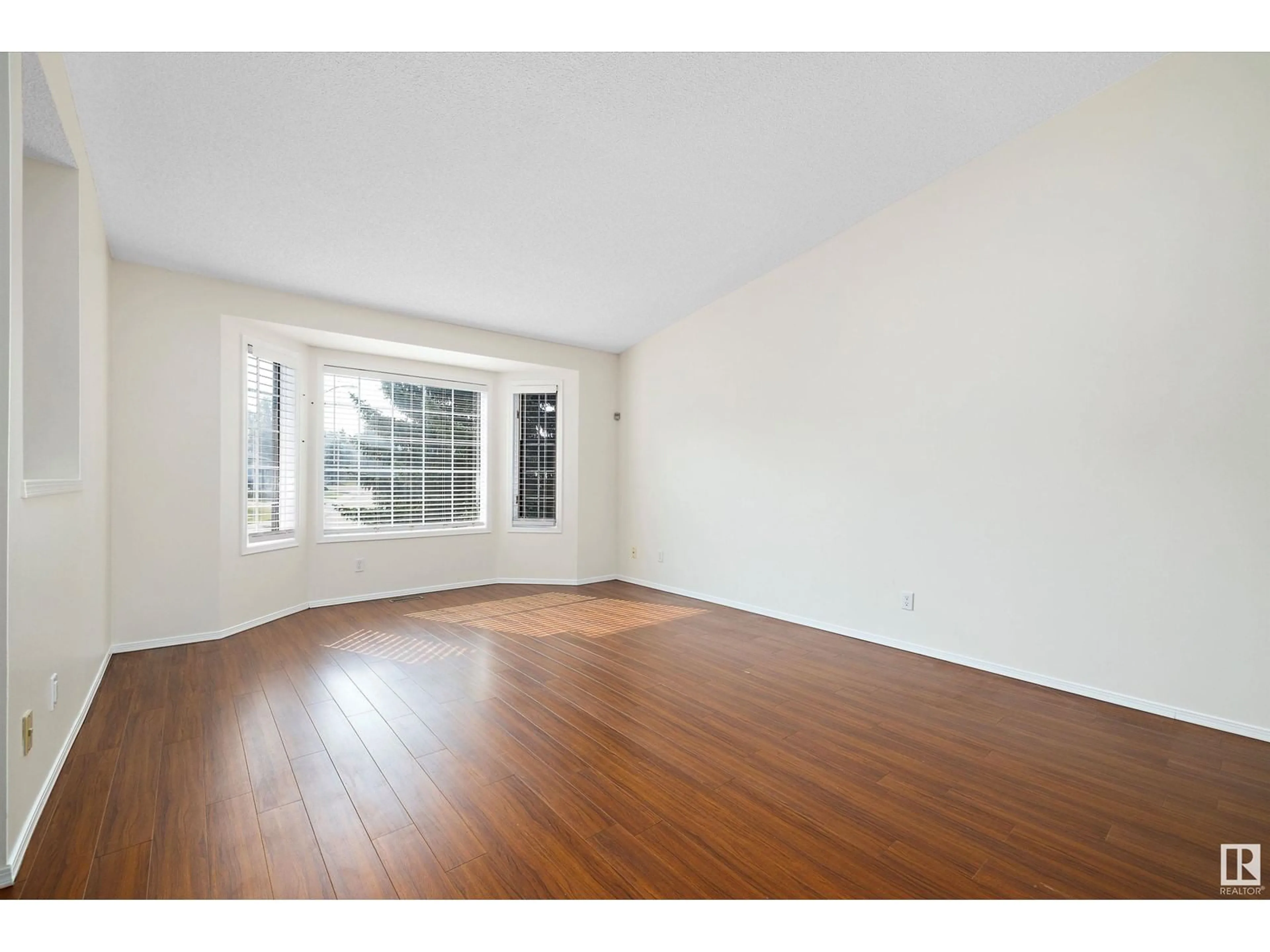 A pic of a room, wood floors for 4432 29 ST NW, Edmonton Alberta T6T1G9