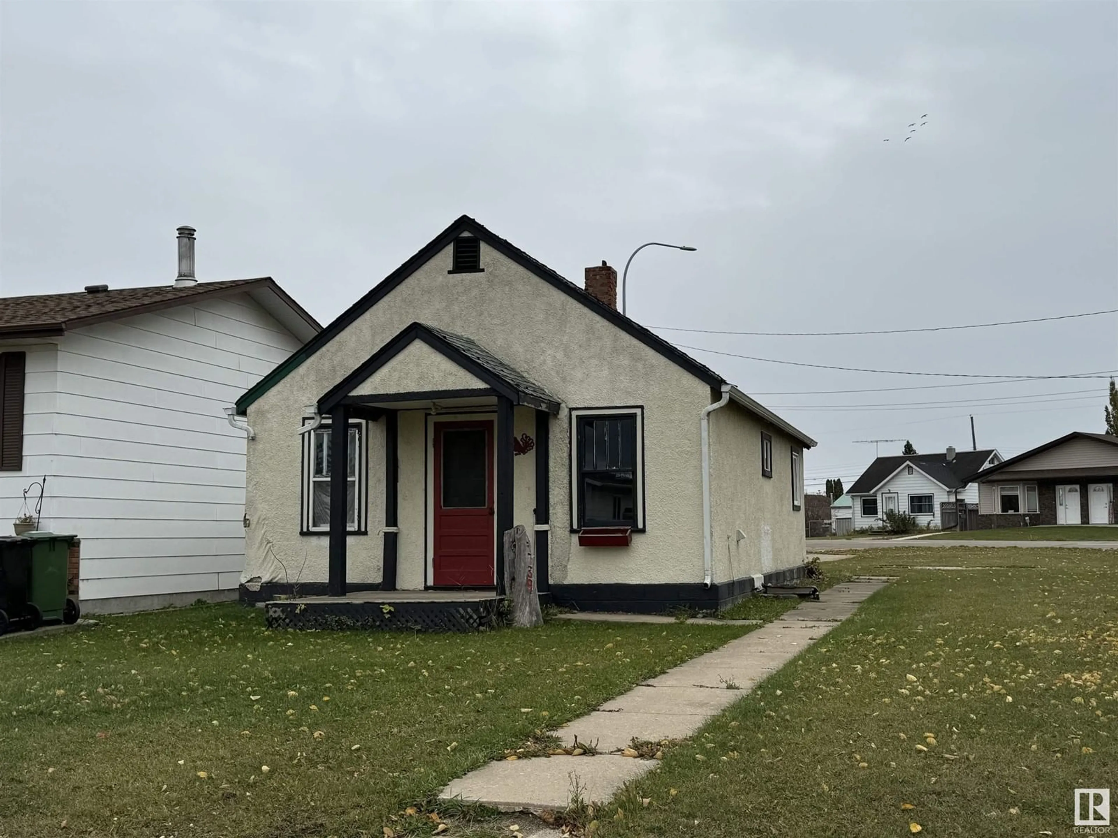 Frontside or backside of a home, the front or back of building for 9739 106 ST, Westlock Alberta T7P1S3