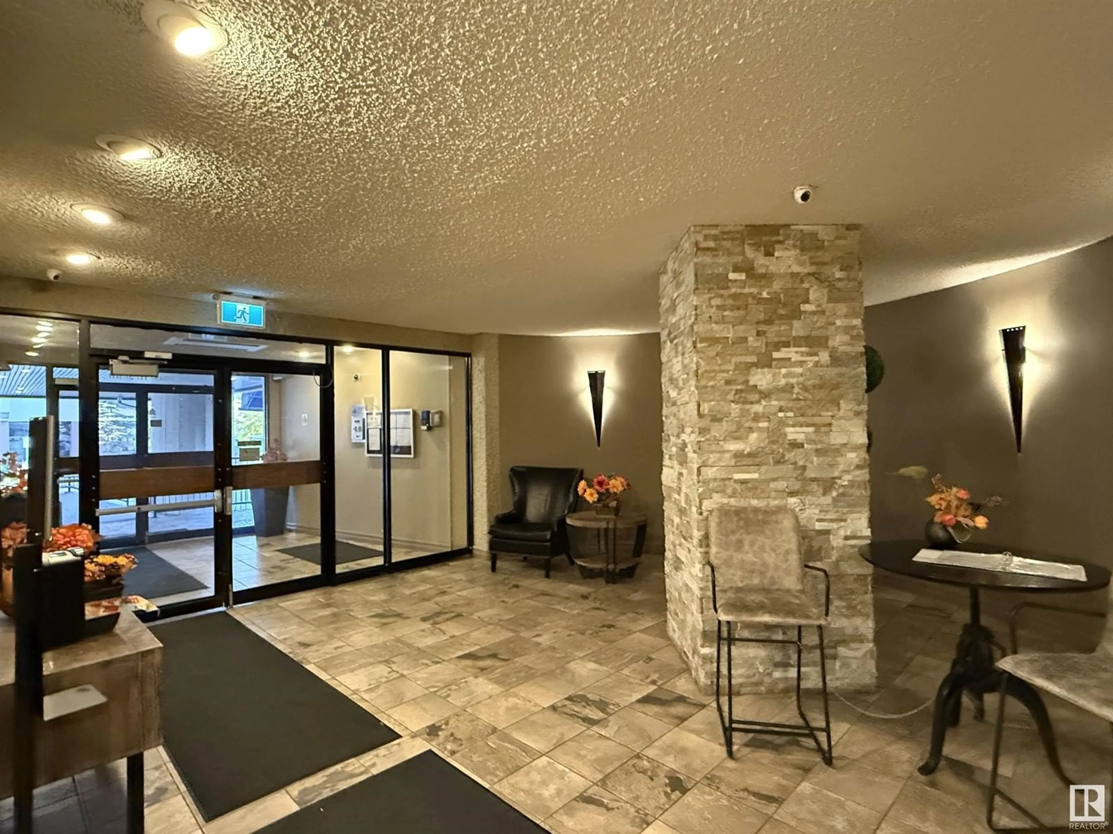 Indoor lobby, cement floor for #401 10045 117 ST NW, Edmonton Alberta T5K1W8