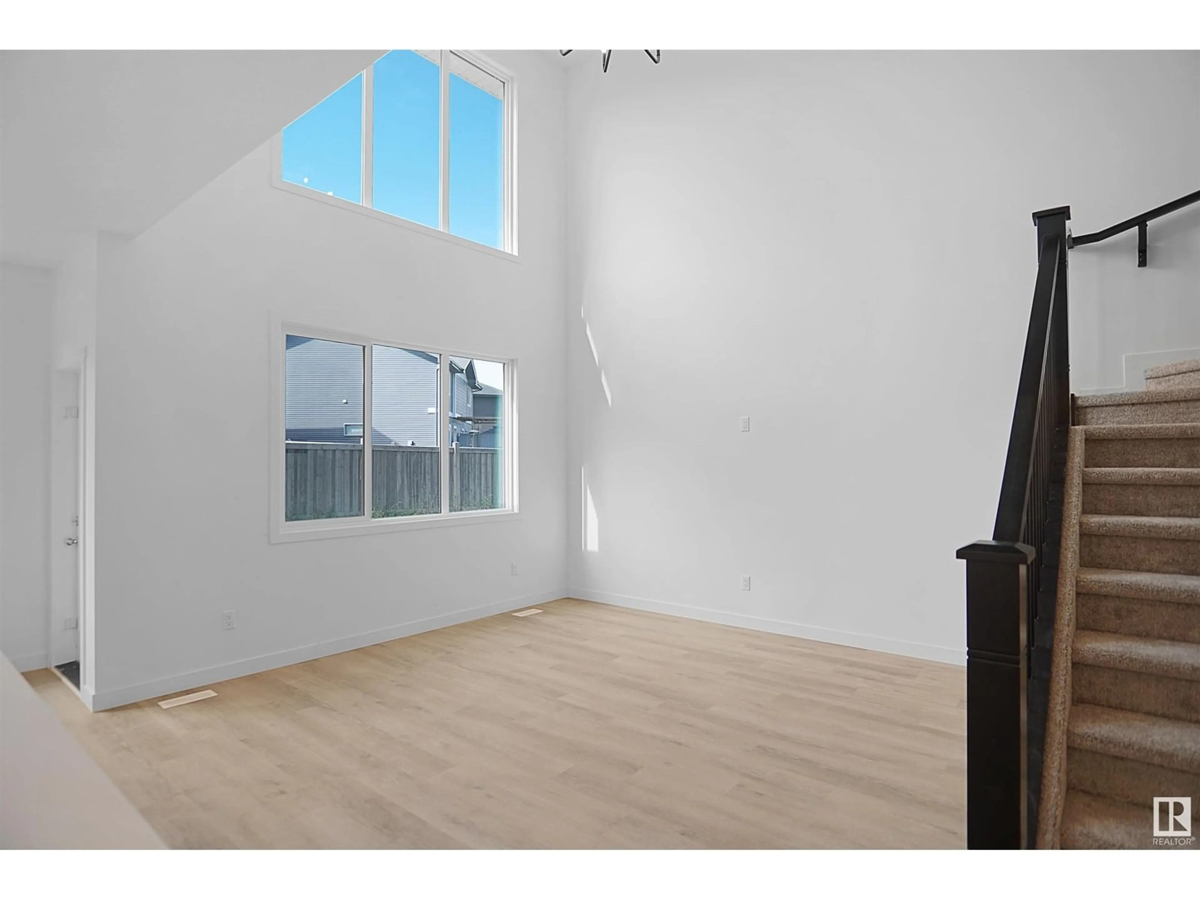 A pic of a room, wood floors for 16603 3 ST NE, Edmonton Alberta T5T7H9