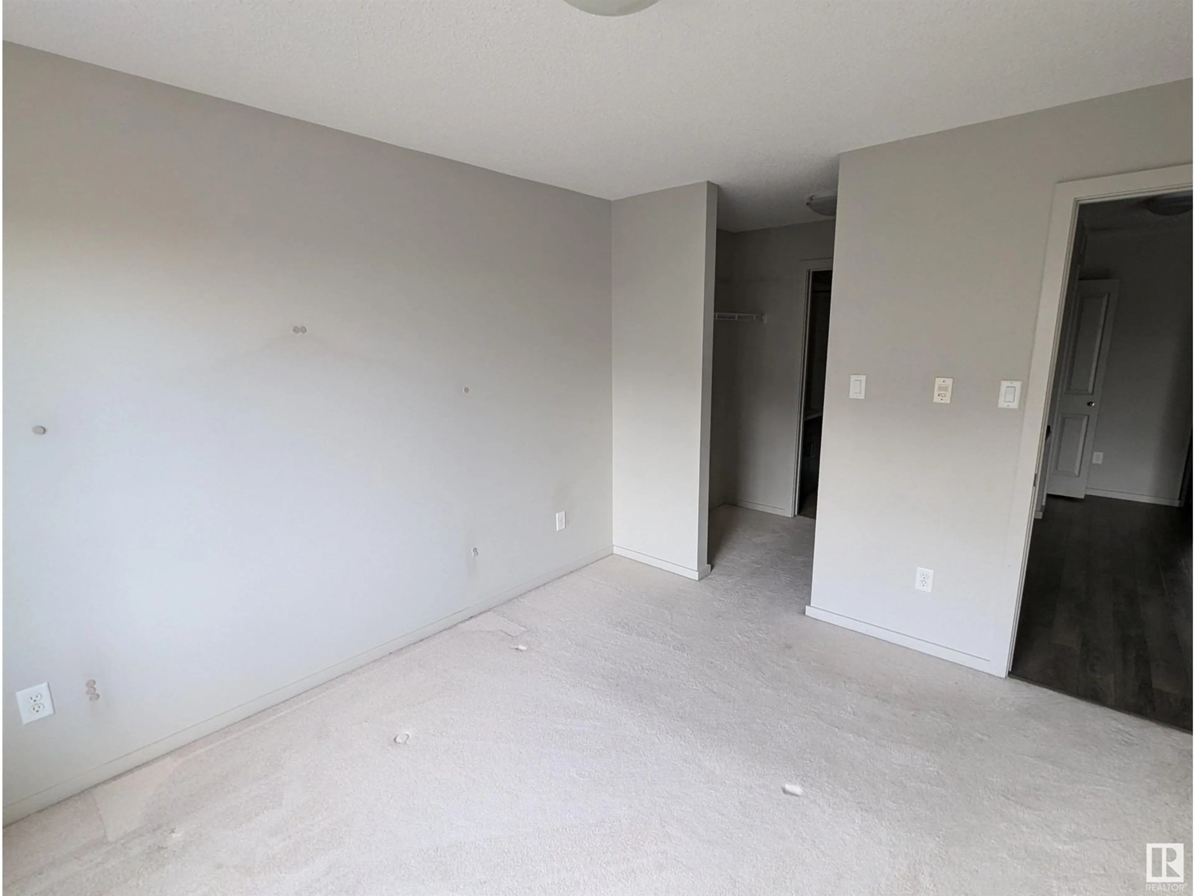 A pic of a room, not visible floor for #307 142 EBBERS BV NW, Edmonton Alberta T5Y3W2