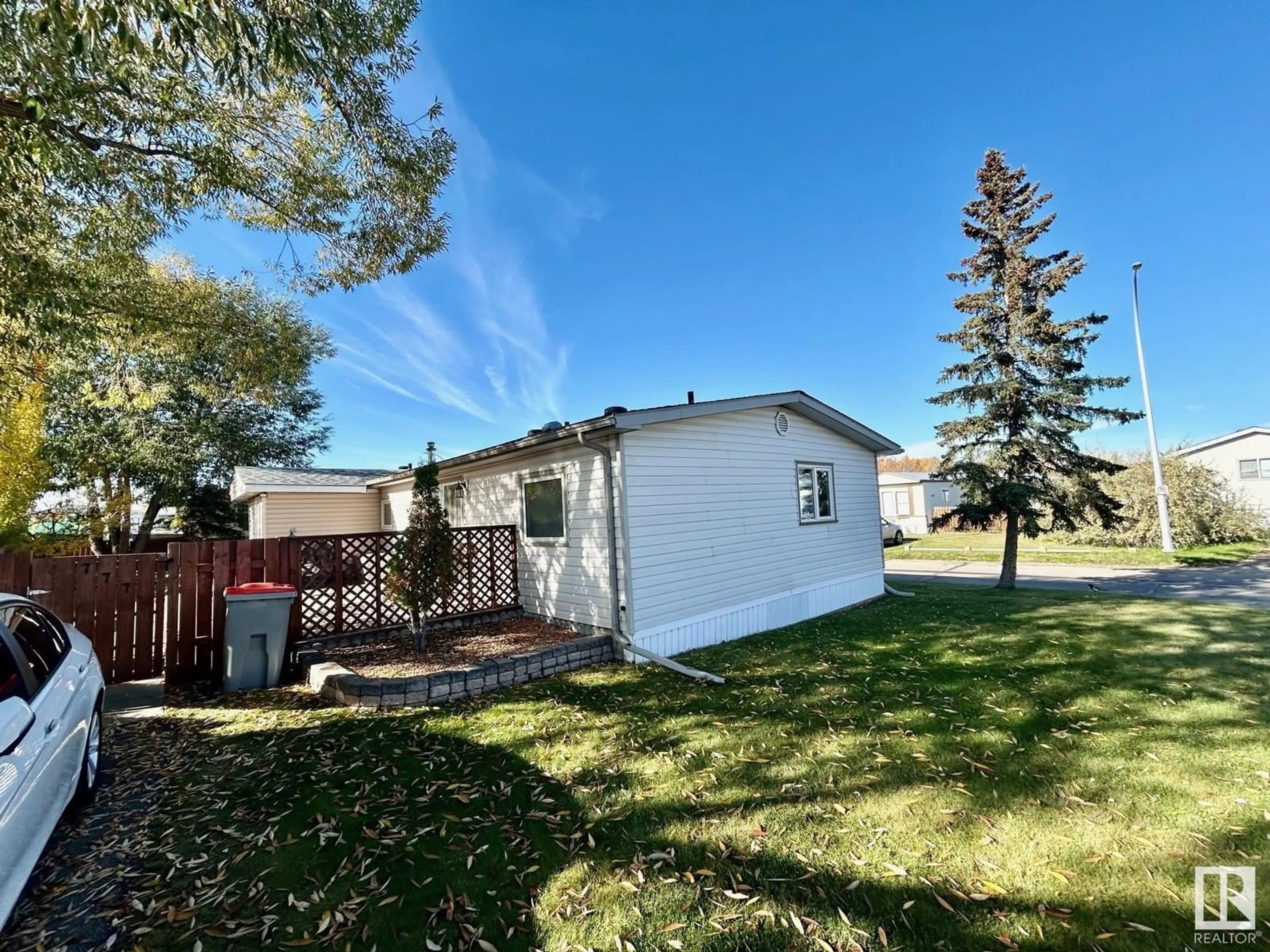 A pic from exterior of the house or condo, the fenced backyard for 777 53222 Range Road 272, Rural Parkland County Alberta T7X3R1