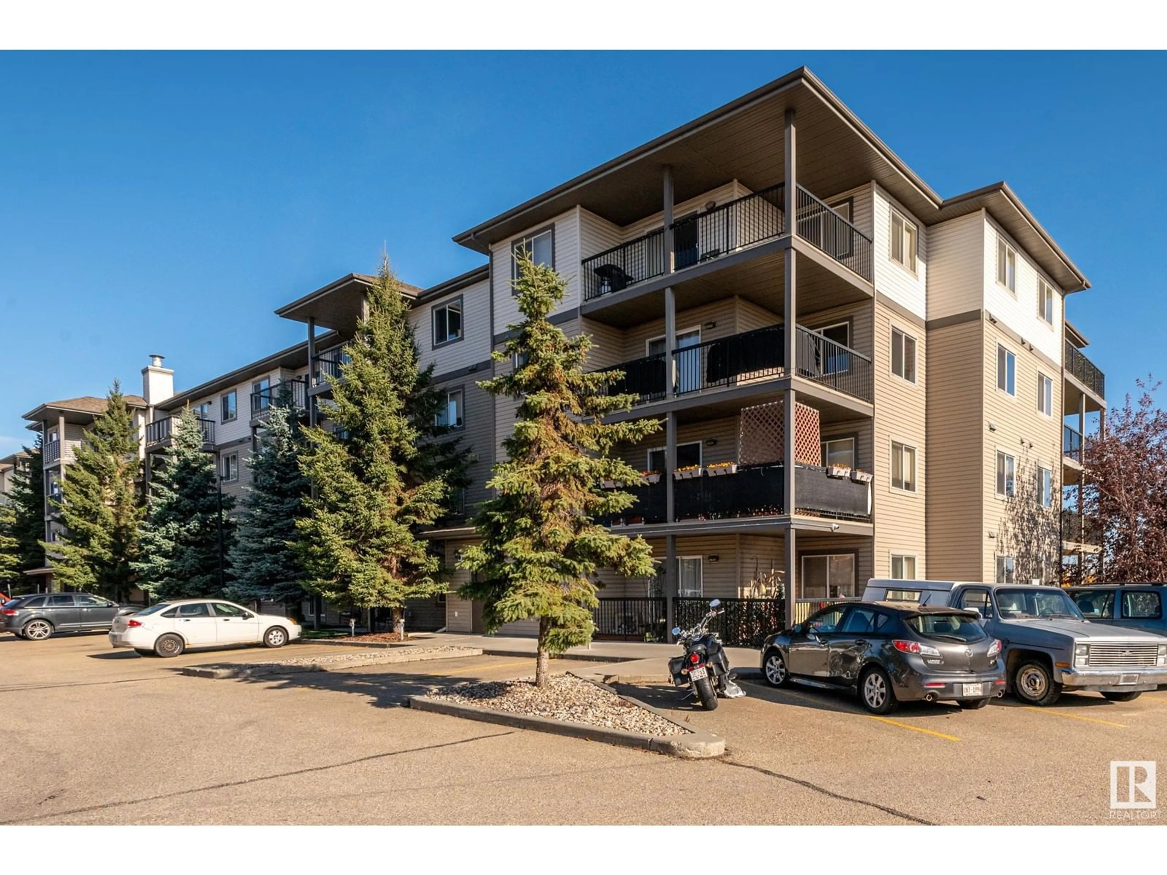 A pic from exterior of the house or condo, the street view for #116 1188 HYNDMAN RD NW, Edmonton Alberta T5A0E9