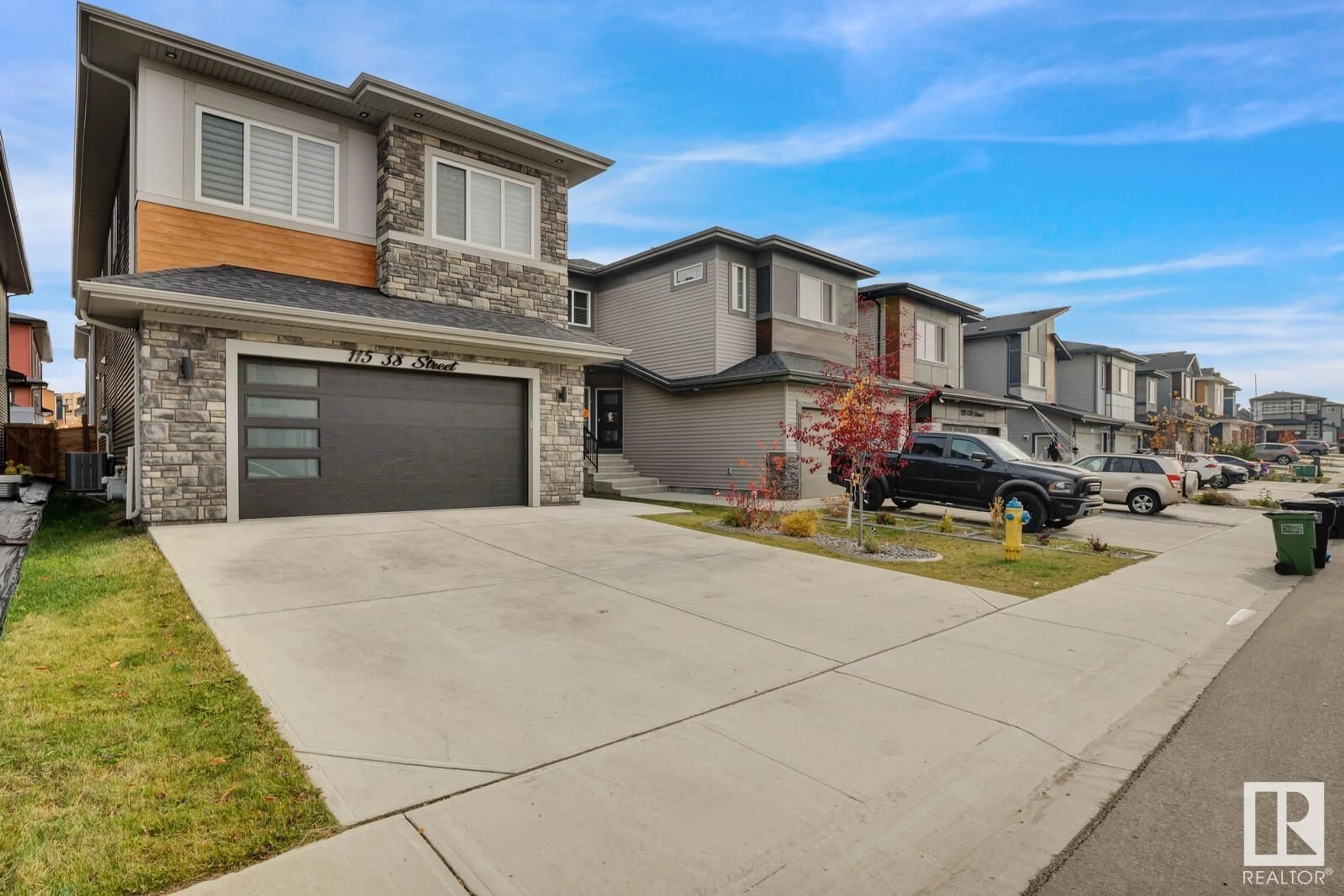 Frontside or backside of a home, the street view for 115 38 ST SW, Edmonton Alberta T6X2W3