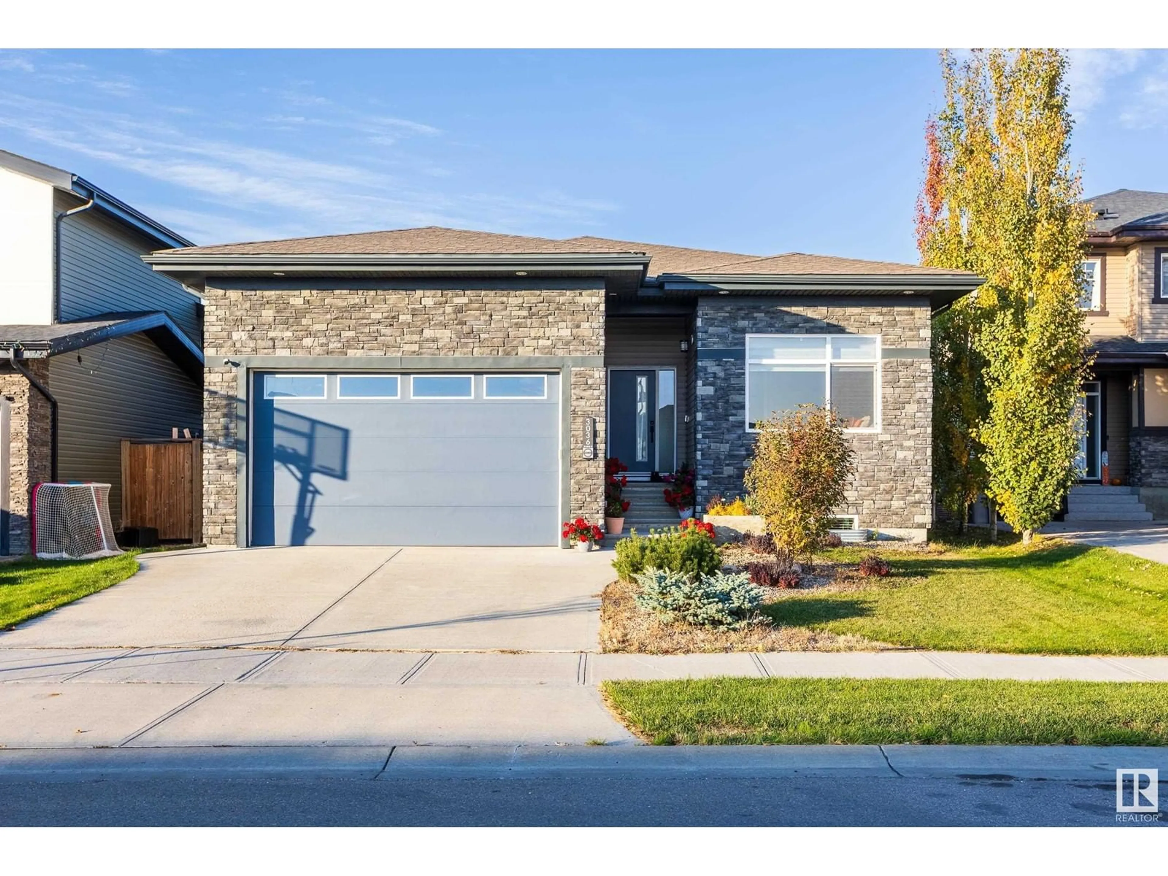 Frontside or backside of a home, the street view for 3036 58 AV NE, Rural Leduc County Alberta T4X0X9