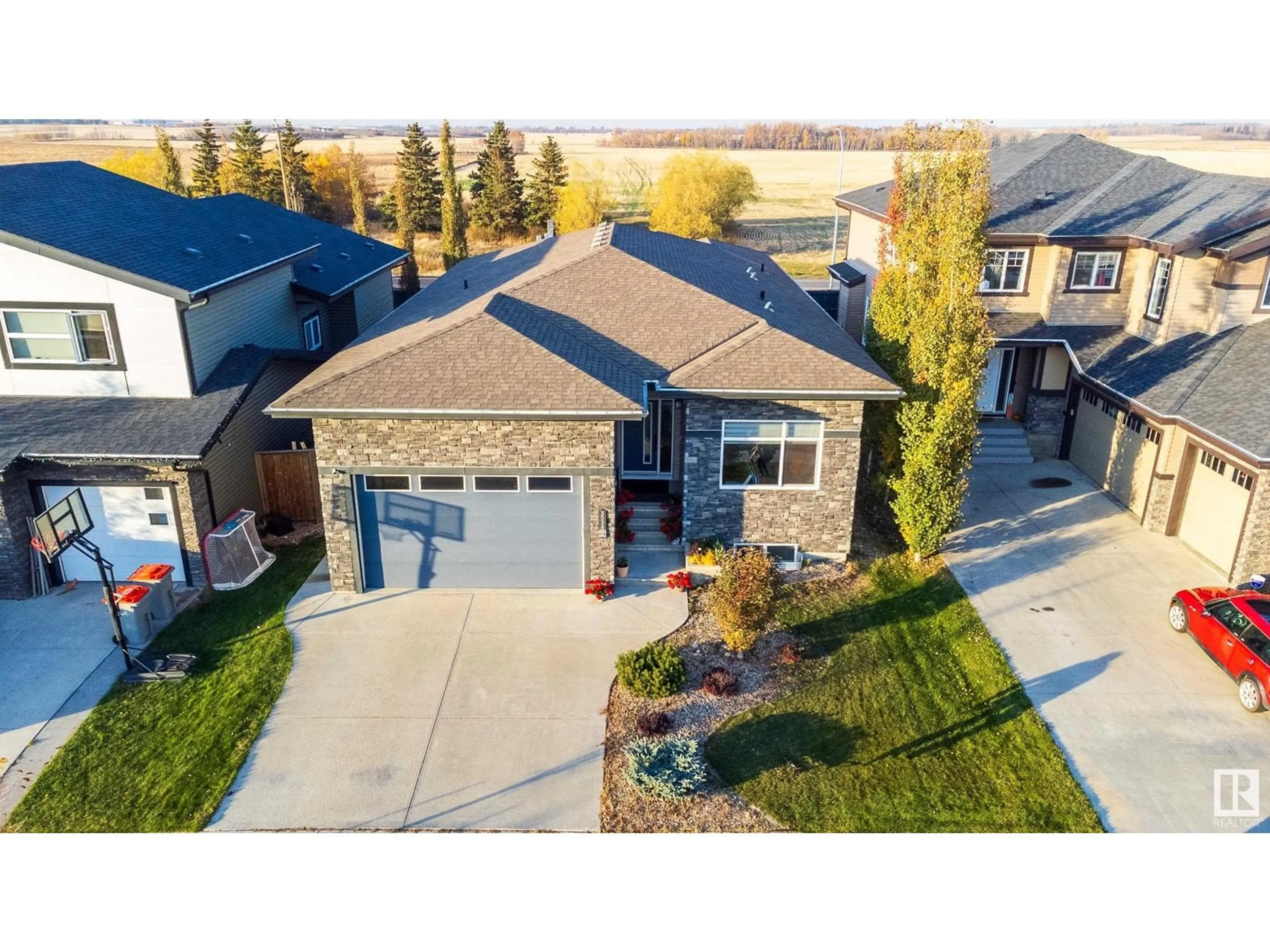 Frontside or backside of a home, the street view for 3036 58 AV NE, Rural Leduc County Alberta T4X0X9