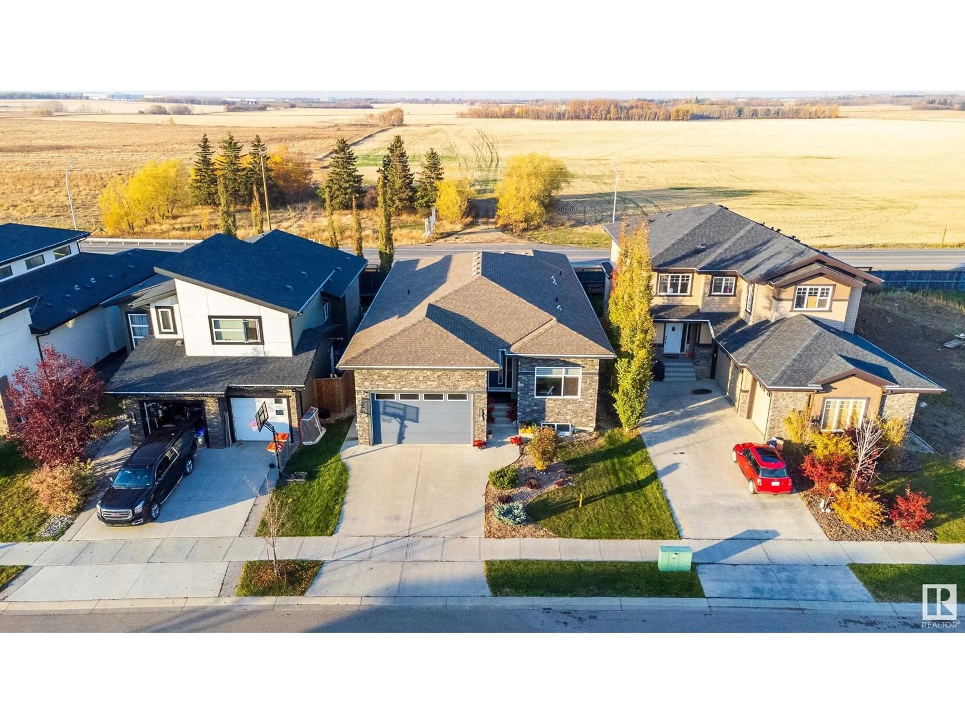 Frontside or backside of a home, the street view for 3036 58 AV NE, Rural Leduc County Alberta T4X0X9