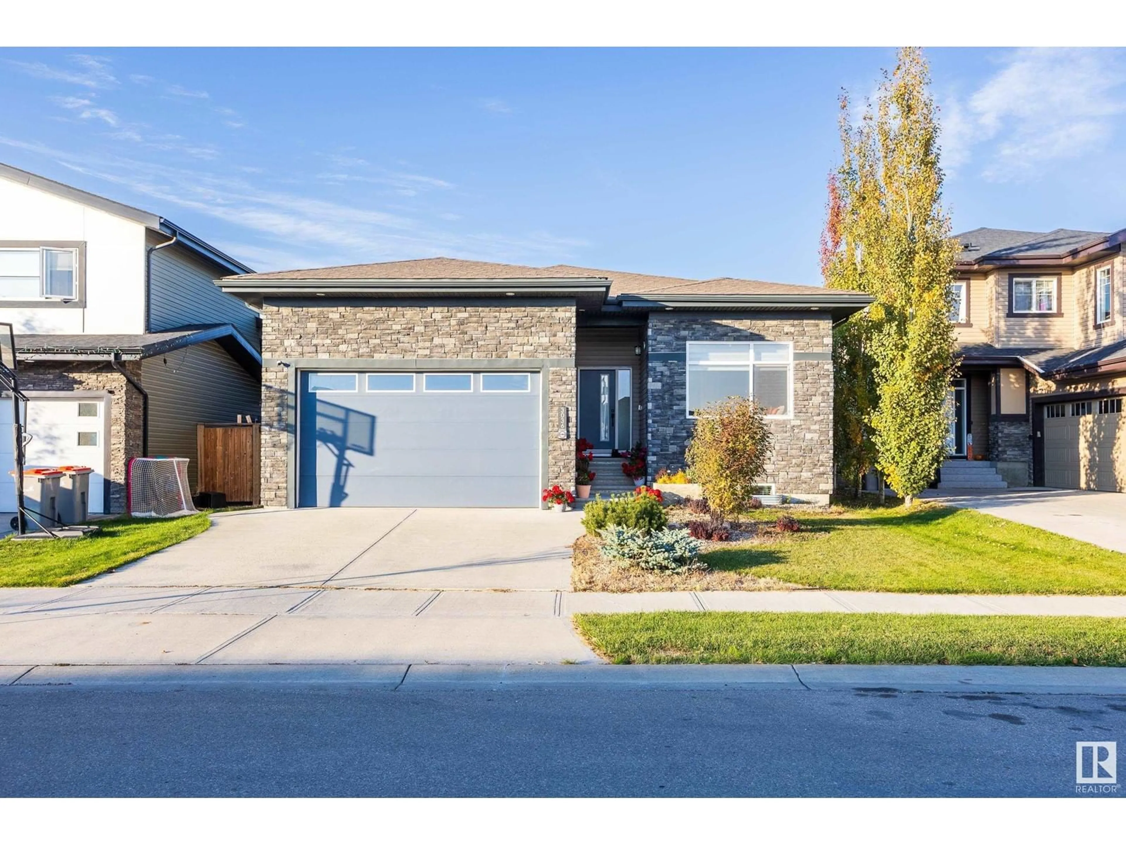 Frontside or backside of a home, the street view for 3036 58 AV NE, Rural Leduc County Alberta T4X0X9