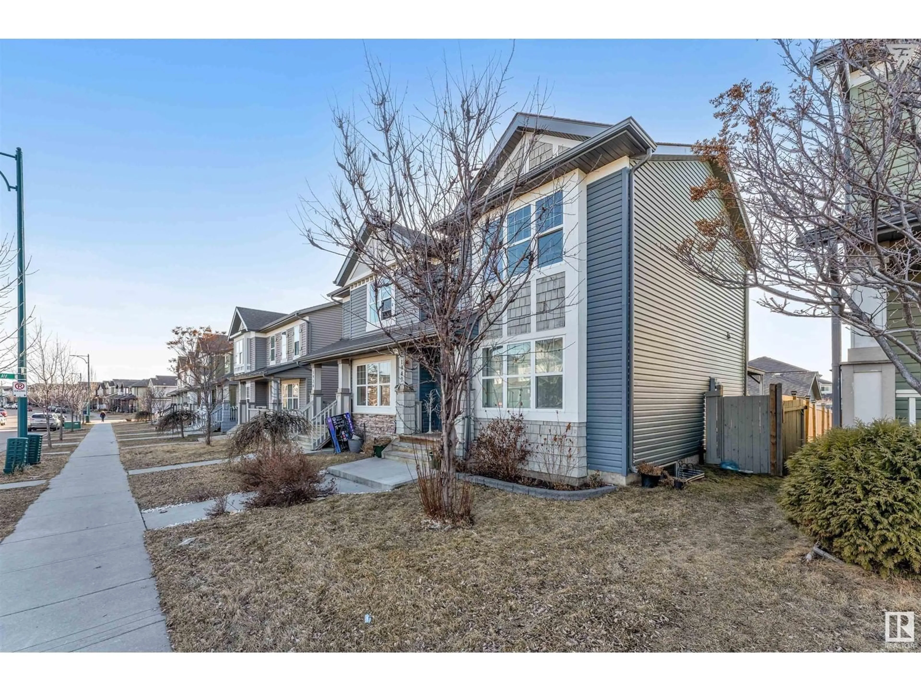 A pic from exterior of the house or condo, the street view for 1940 32 STREET NW, Edmonton Alberta T6T0L7