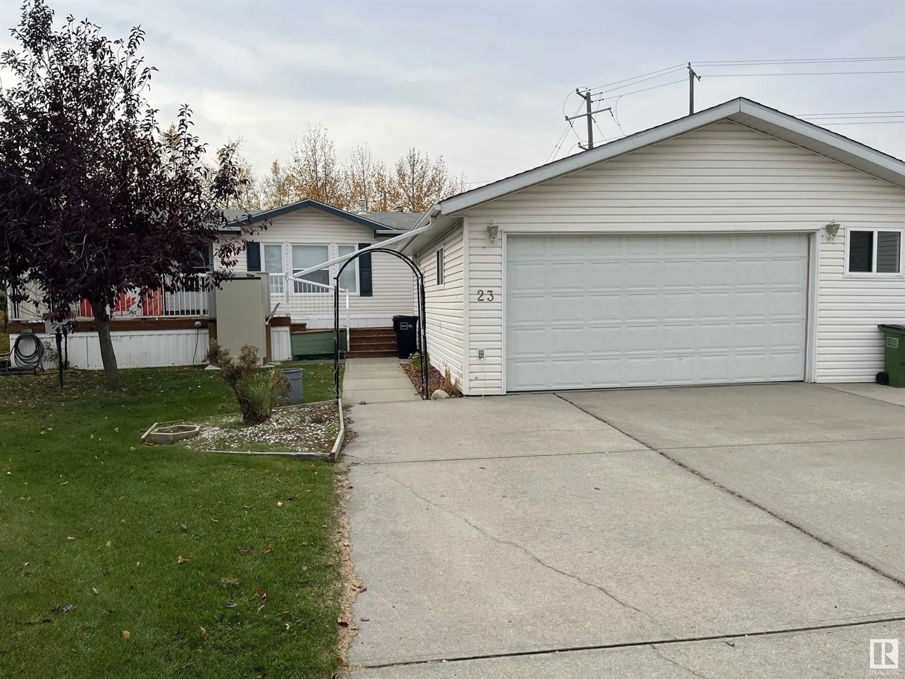 Frontside or backside of a home, the street view for 23 Crystal CR NW, Edmonton Alberta T6P1Z6