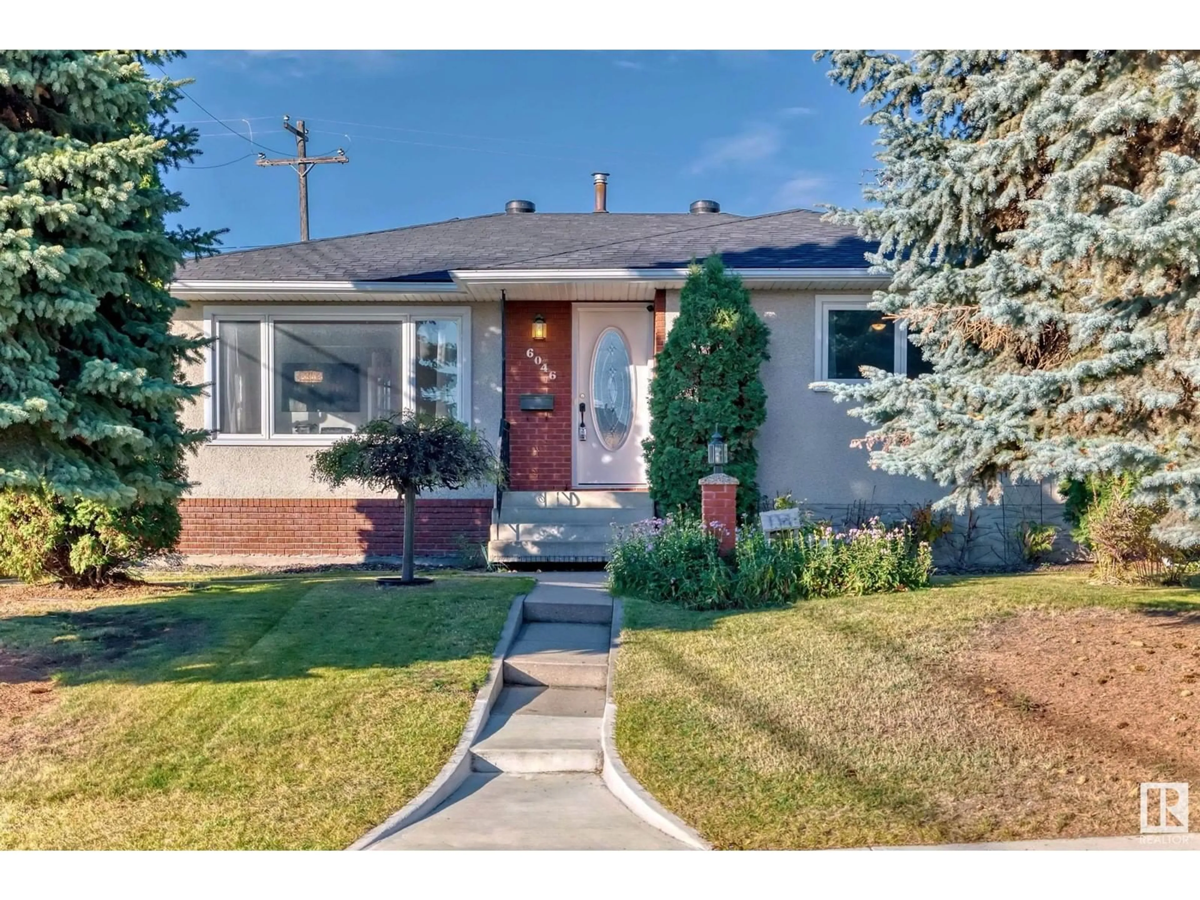 Frontside or backside of a home, the street view for 6046 105A ST NW, Edmonton Alberta T6H2P6