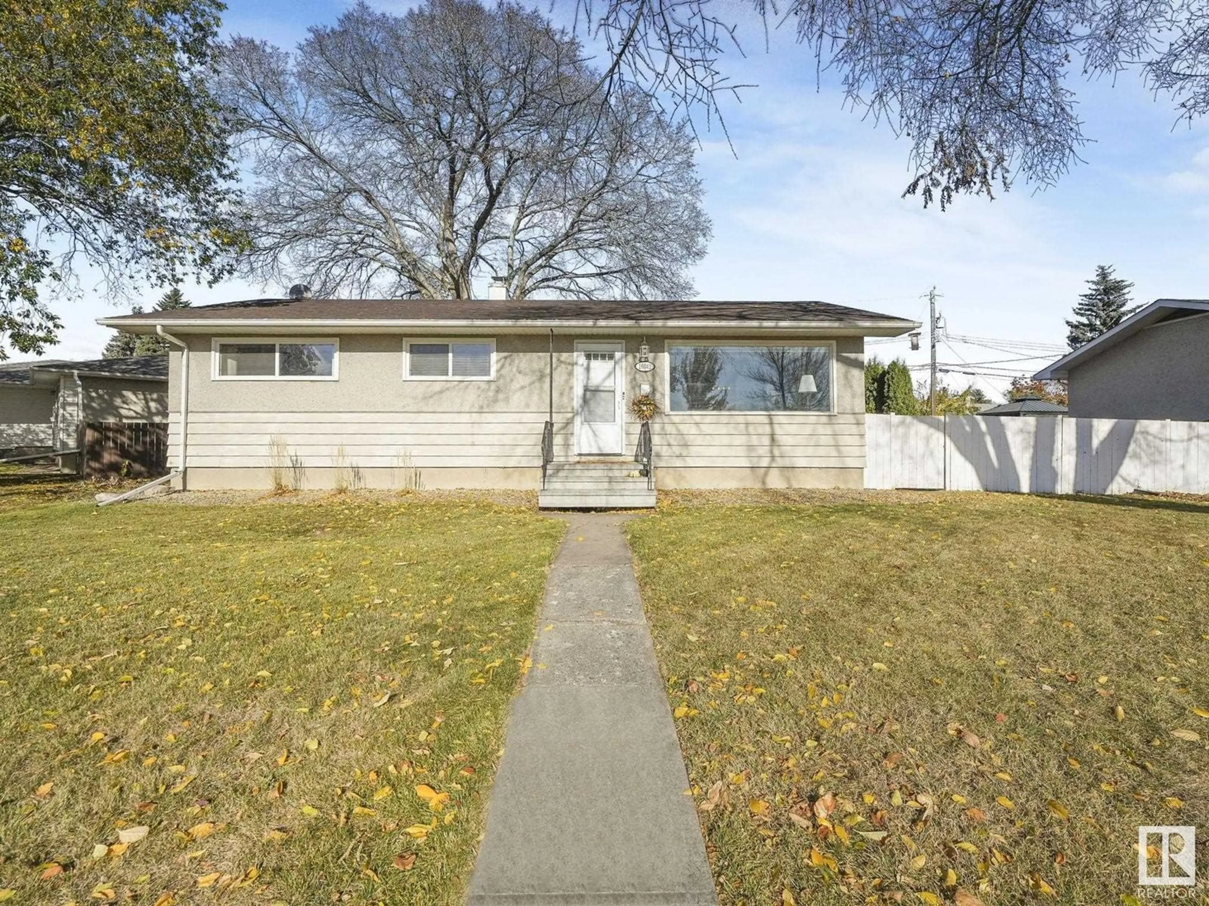 Frontside or backside of a home, the street view for 16042 93 AV NW, Edmonton Alberta T5R5H8