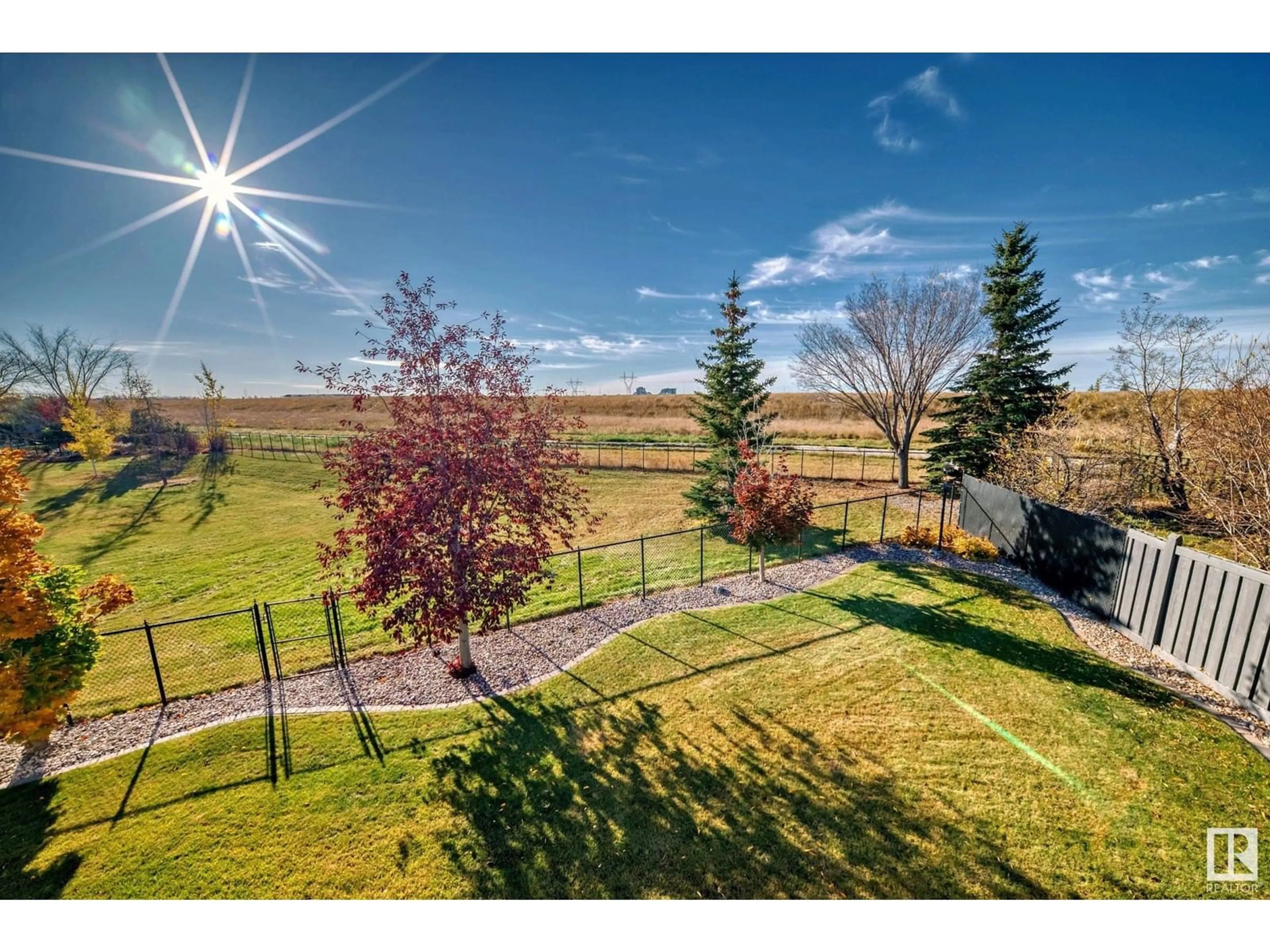 Patio, the fenced backyard for 1527 HASWELL CL NW, Edmonton Alberta T6R3J4