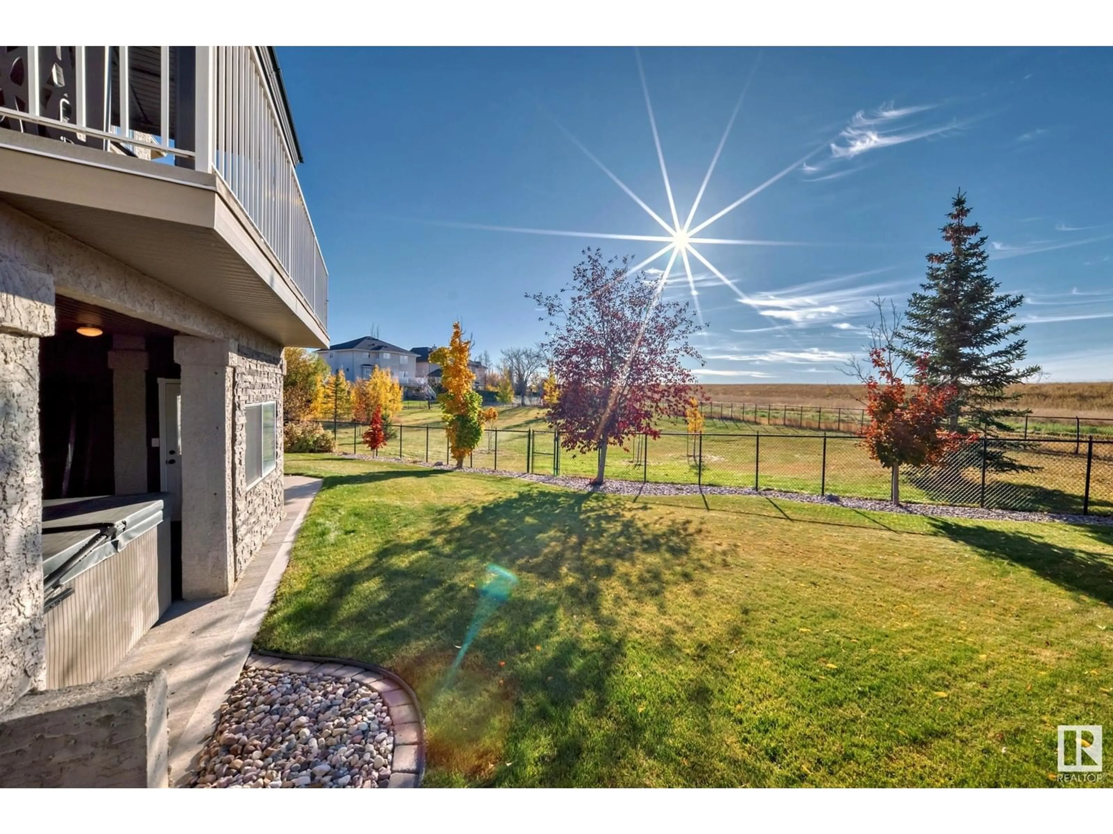 A pic from exterior of the house or condo, the fenced backyard for 1527 HASWELL CL NW, Edmonton Alberta T6R3J4