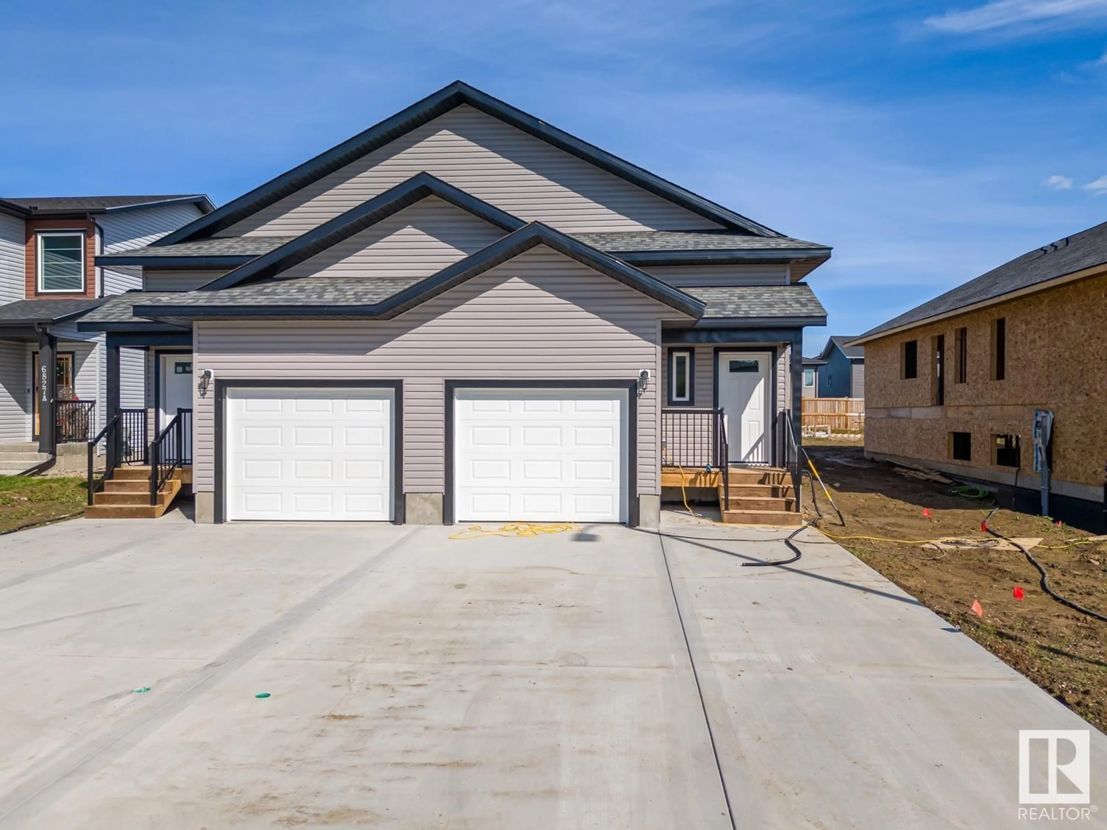 Home with vinyl exterior material, street for 6825A TRI CITY WY, Cold Lake Alberta T9M0L3