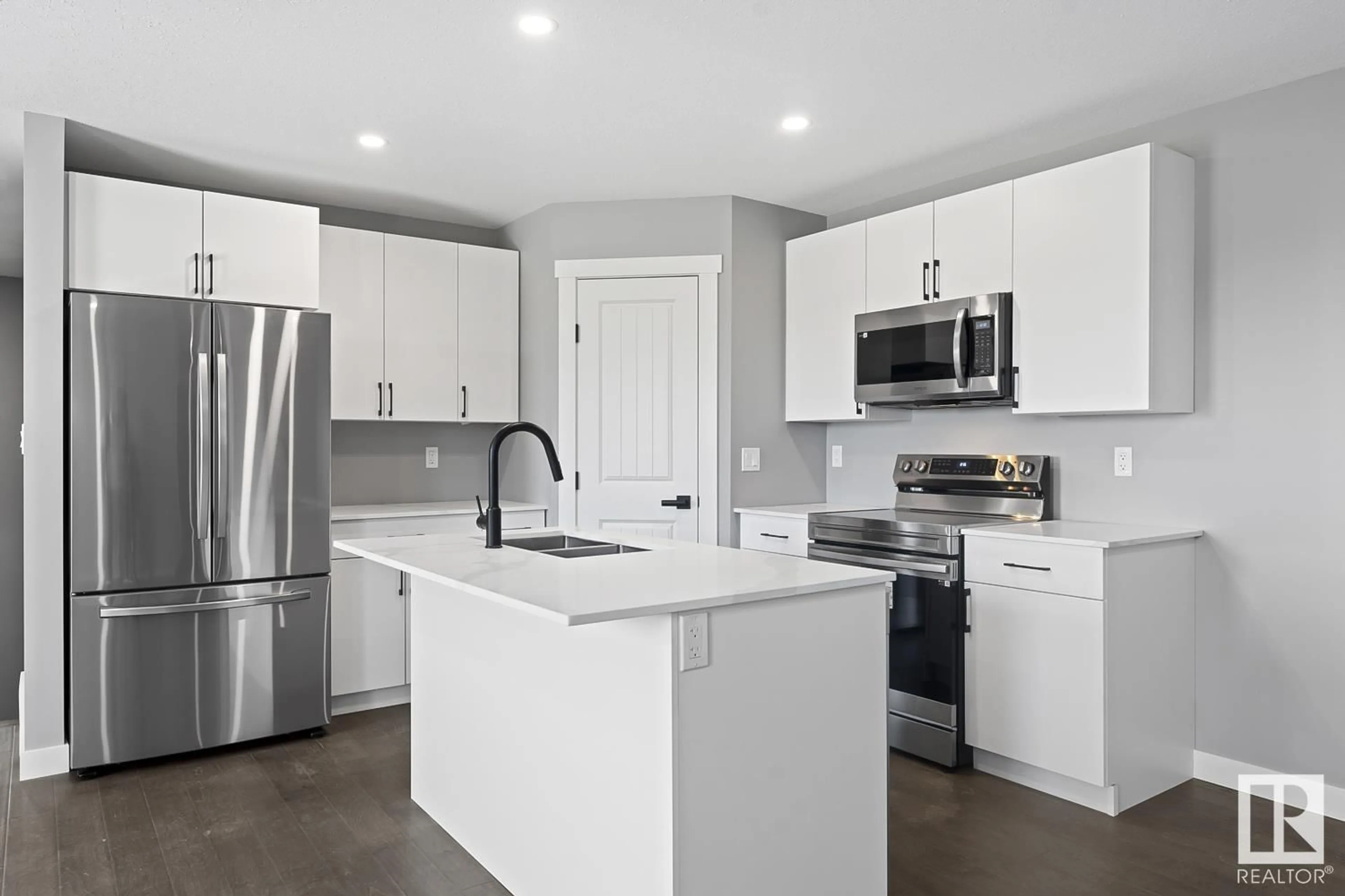 Open concept kitchen, ceramic/tile floor for 6825A TRI CITY WY, Cold Lake Alberta T9M0L3