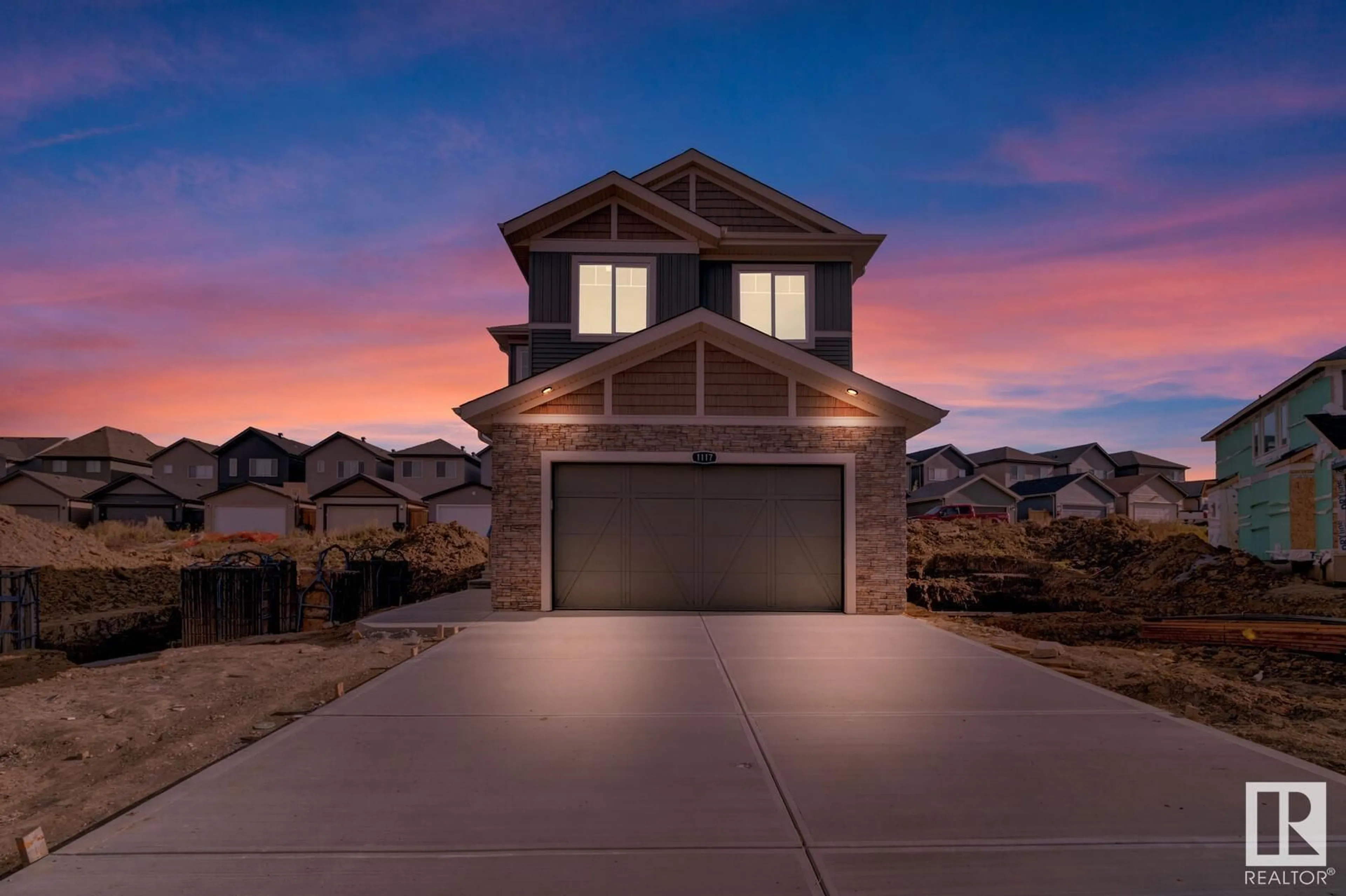 Frontside or backside of a home, the street view for 1117 GYRFALCON CR NW, Edmonton Alberta T5S0S5