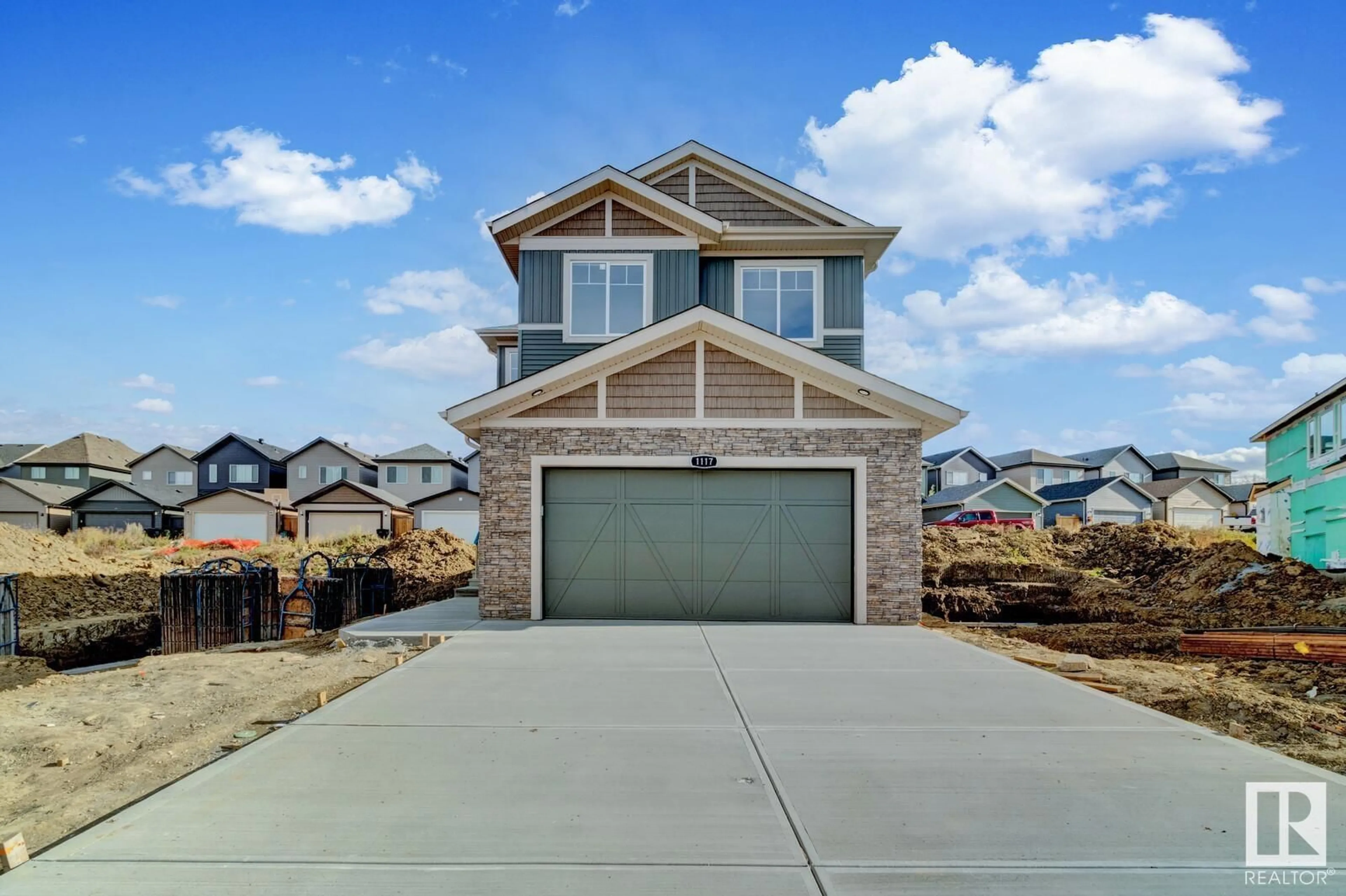 Frontside or backside of a home, the street view for 1117 GYRFALCON CR NW, Edmonton Alberta T5S0S5