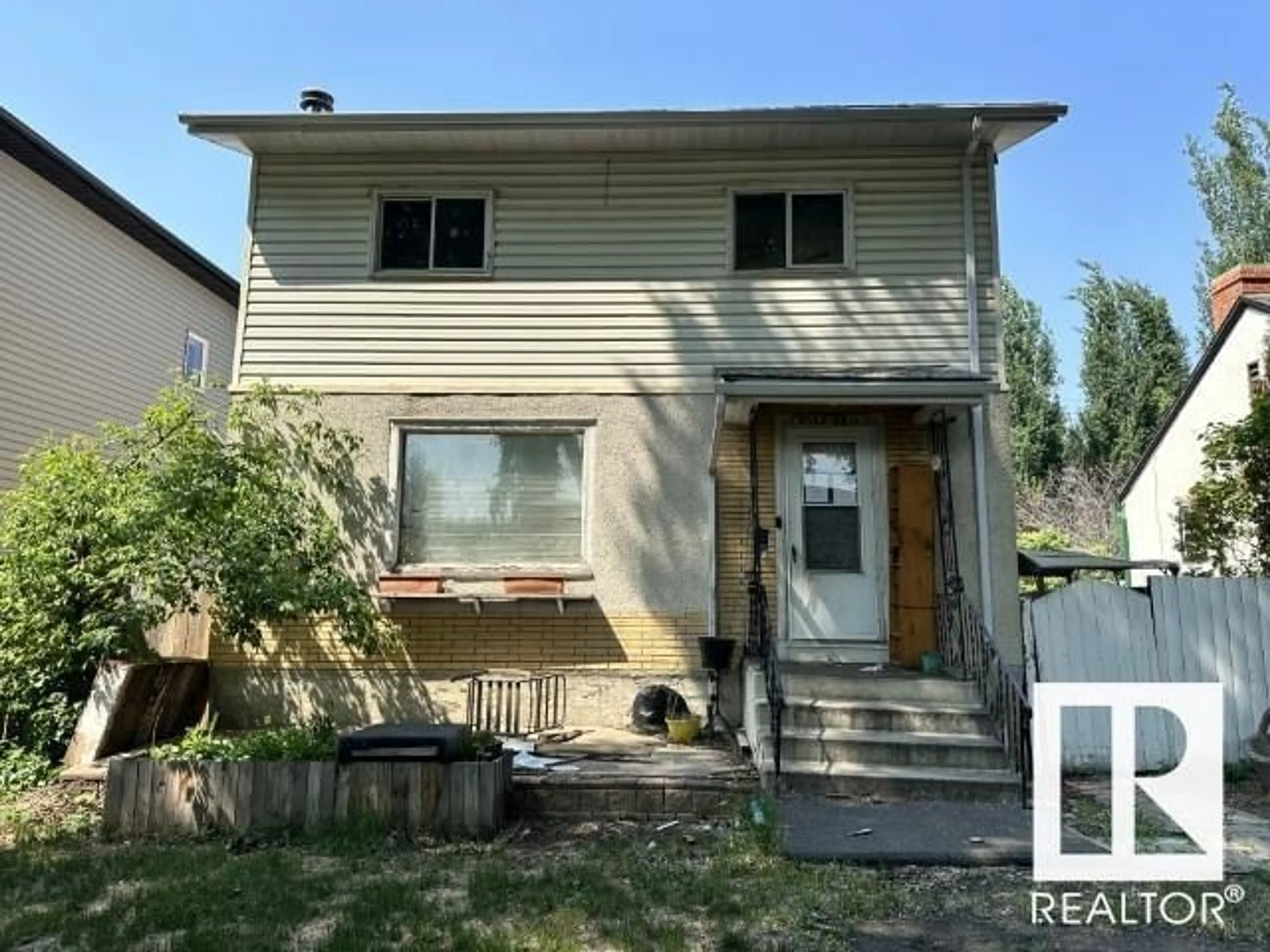 Frontside or backside of a home, the street view for 11532 88 ST NE NW, Edmonton Alberta T5B3R3