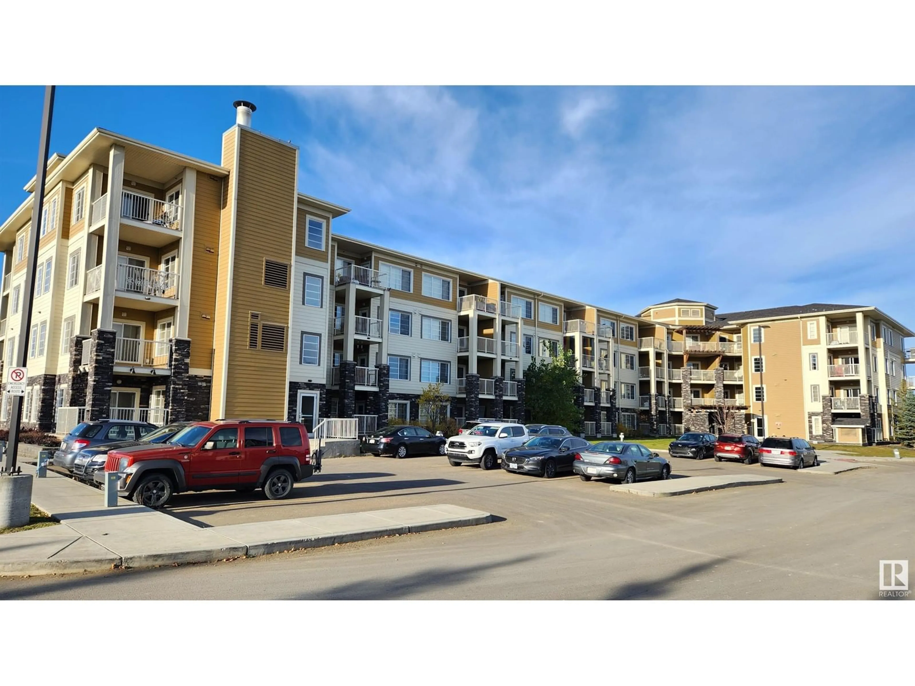 A pic from exterior of the house or condo, the street view for #216 3670 139 AV NW, Edmonton Alberta T5Y3N5