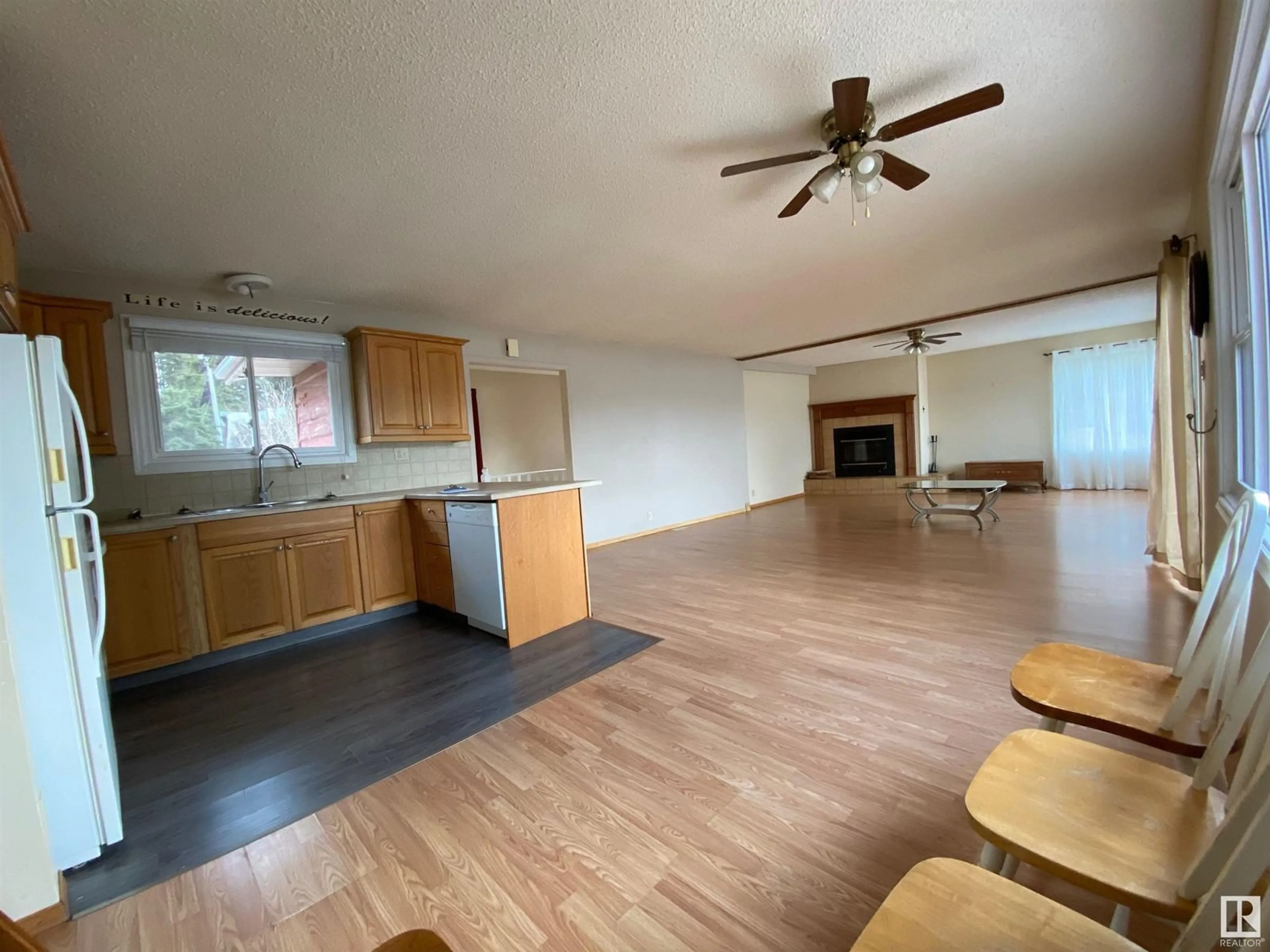 A pic of a room, wood floors for 410 Spruce AV, Rural Athabasca County Alberta T0A0M0