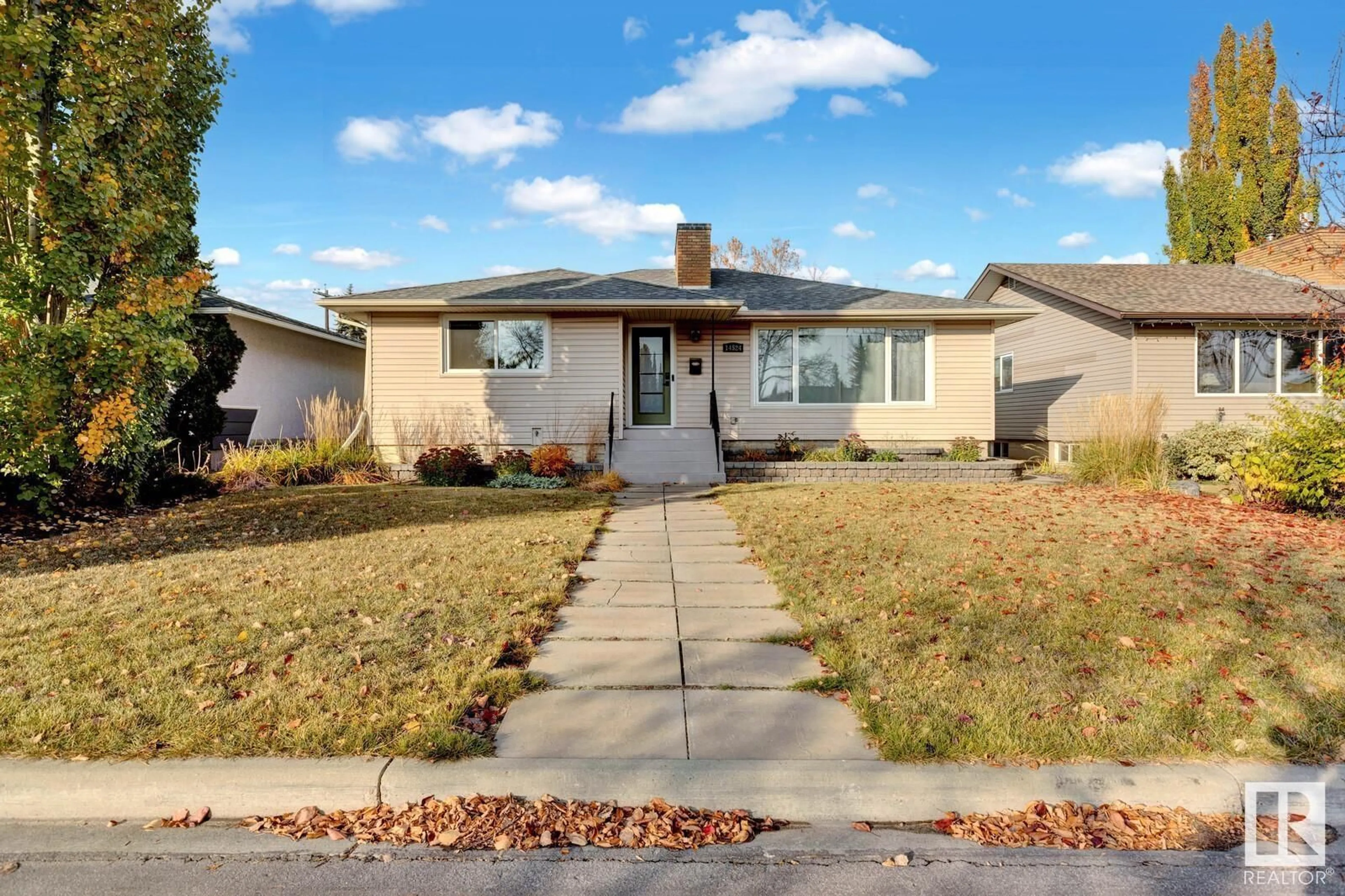 Frontside or backside of a home, the street view for 14524 87 AV NW, Edmonton Alberta T5R4E4