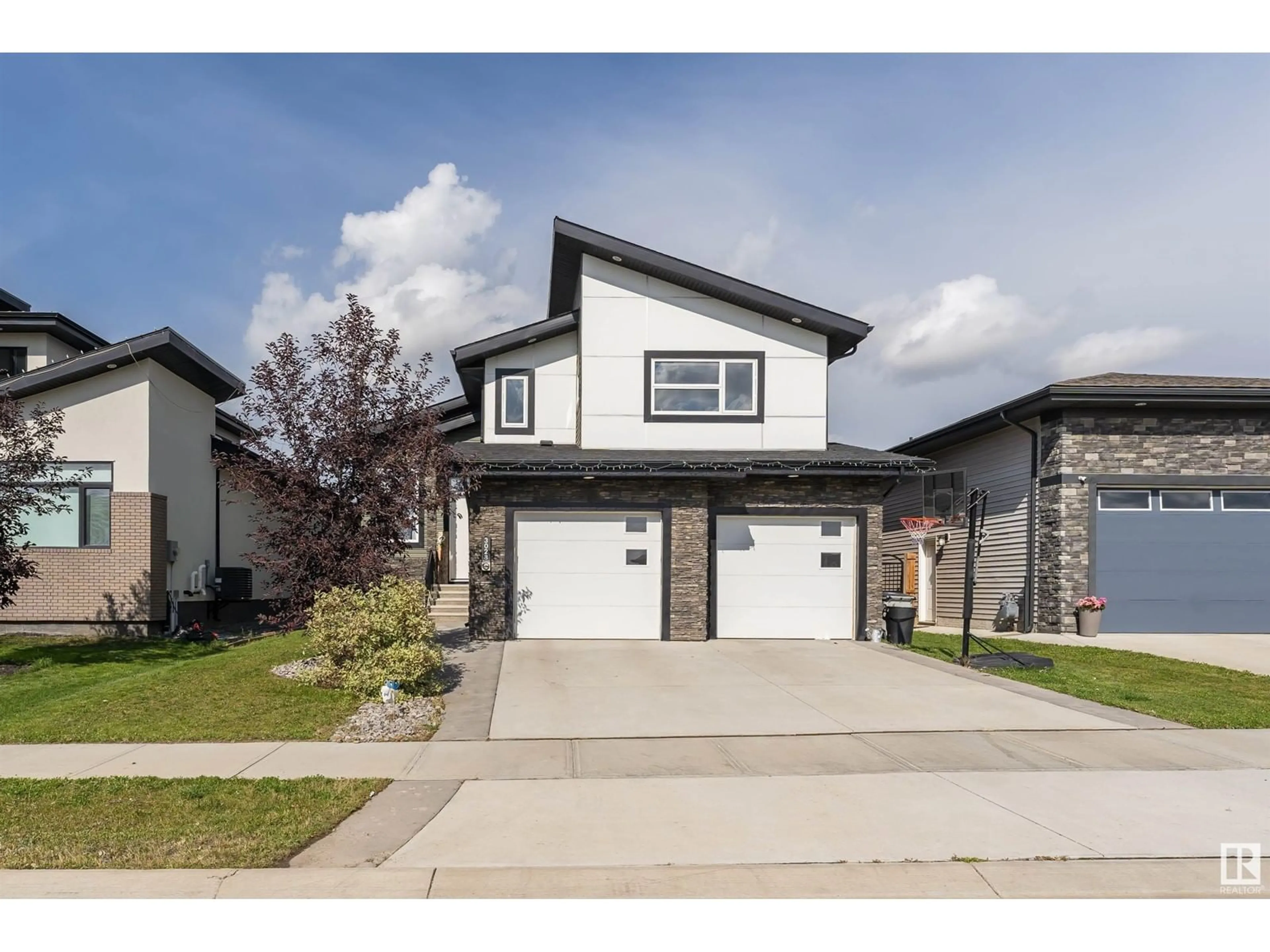 Frontside or backside of a home, the street view for 3028 58 AV, Rural Leduc County Alberta T4X0X9